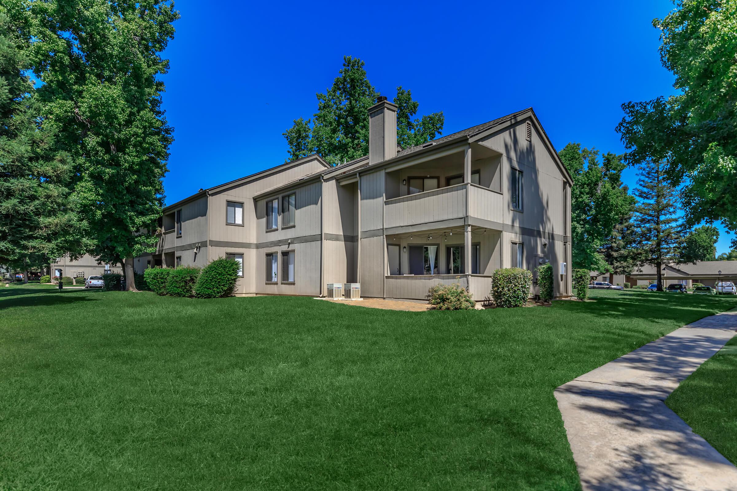 a large lawn in front of a house