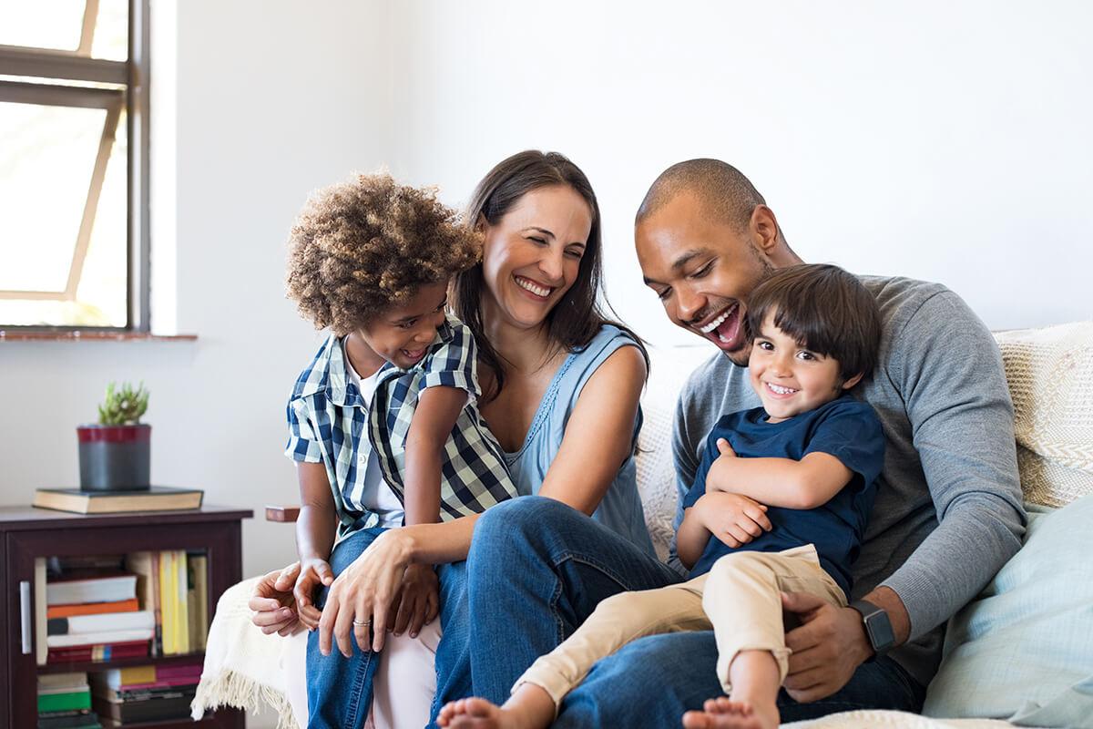 a group of people sitting on a couch