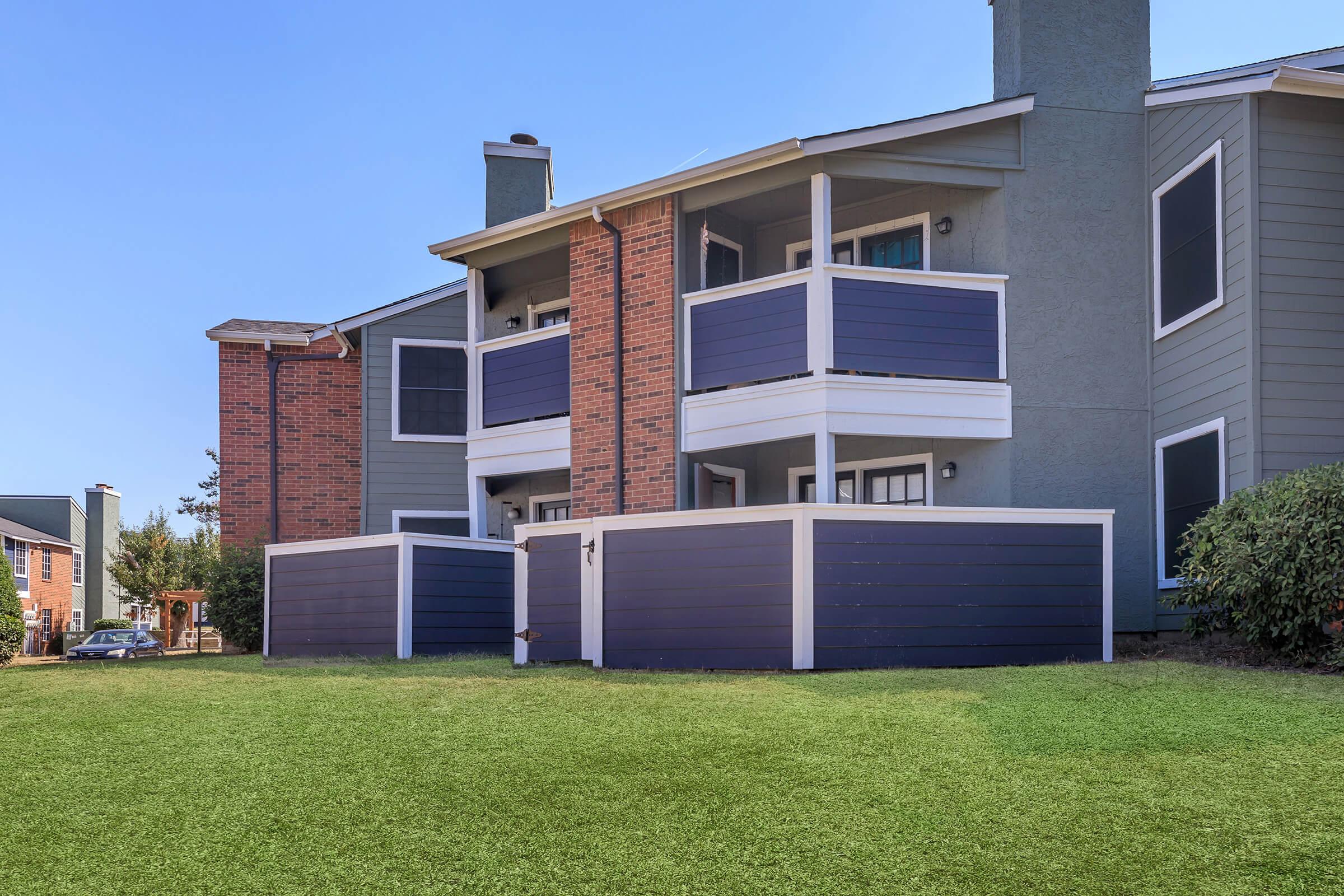 a large lawn in front of a building