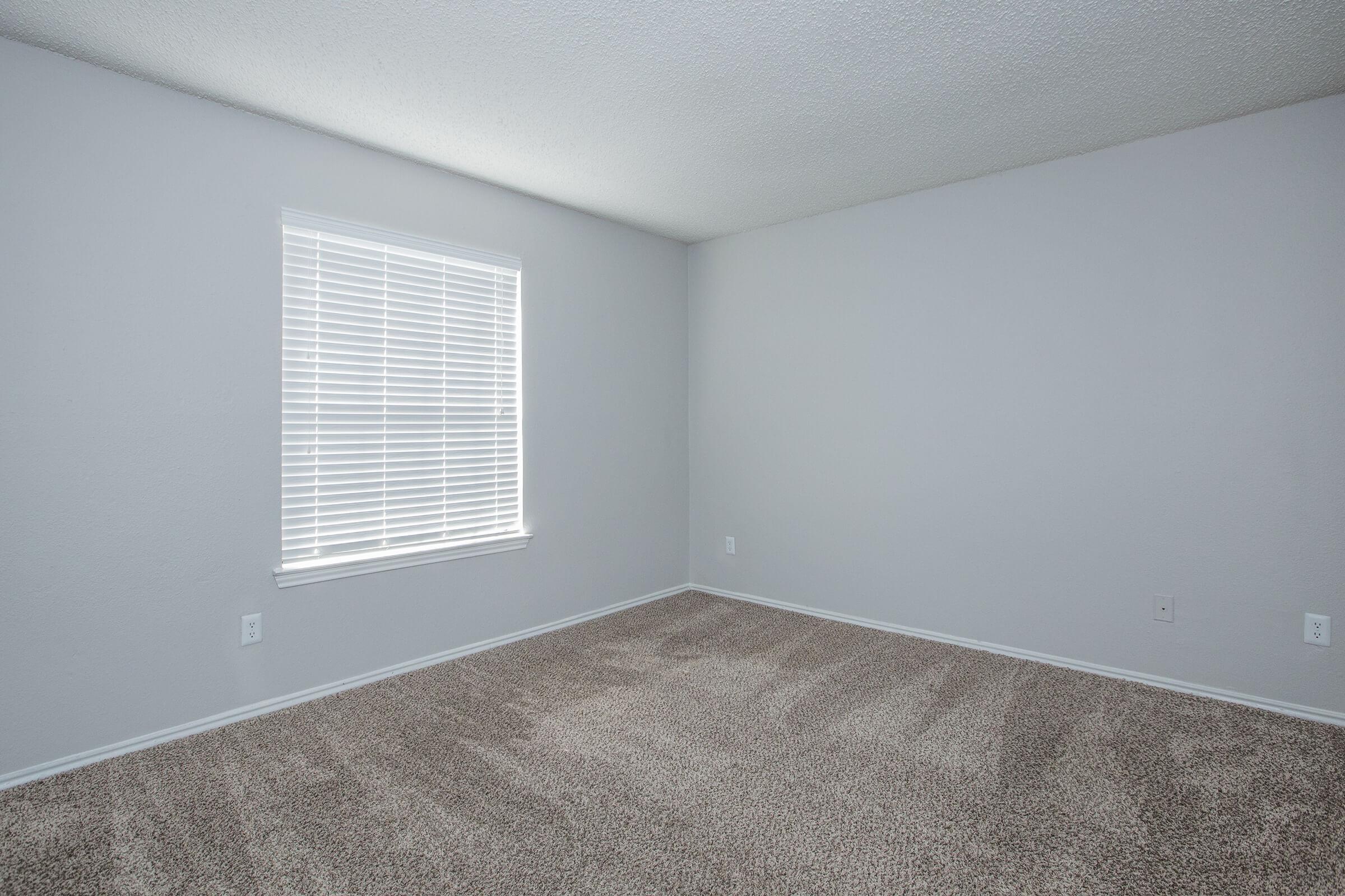 a room with a sink and a window