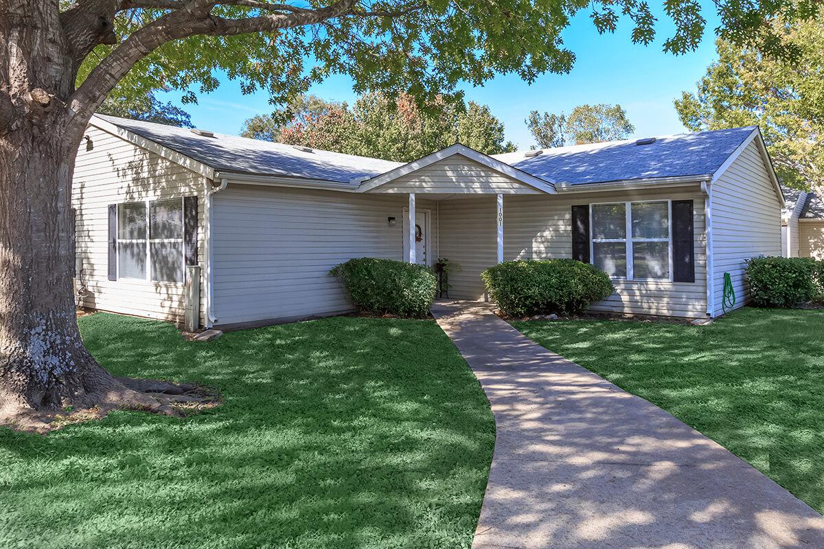 a large lawn in front of a house