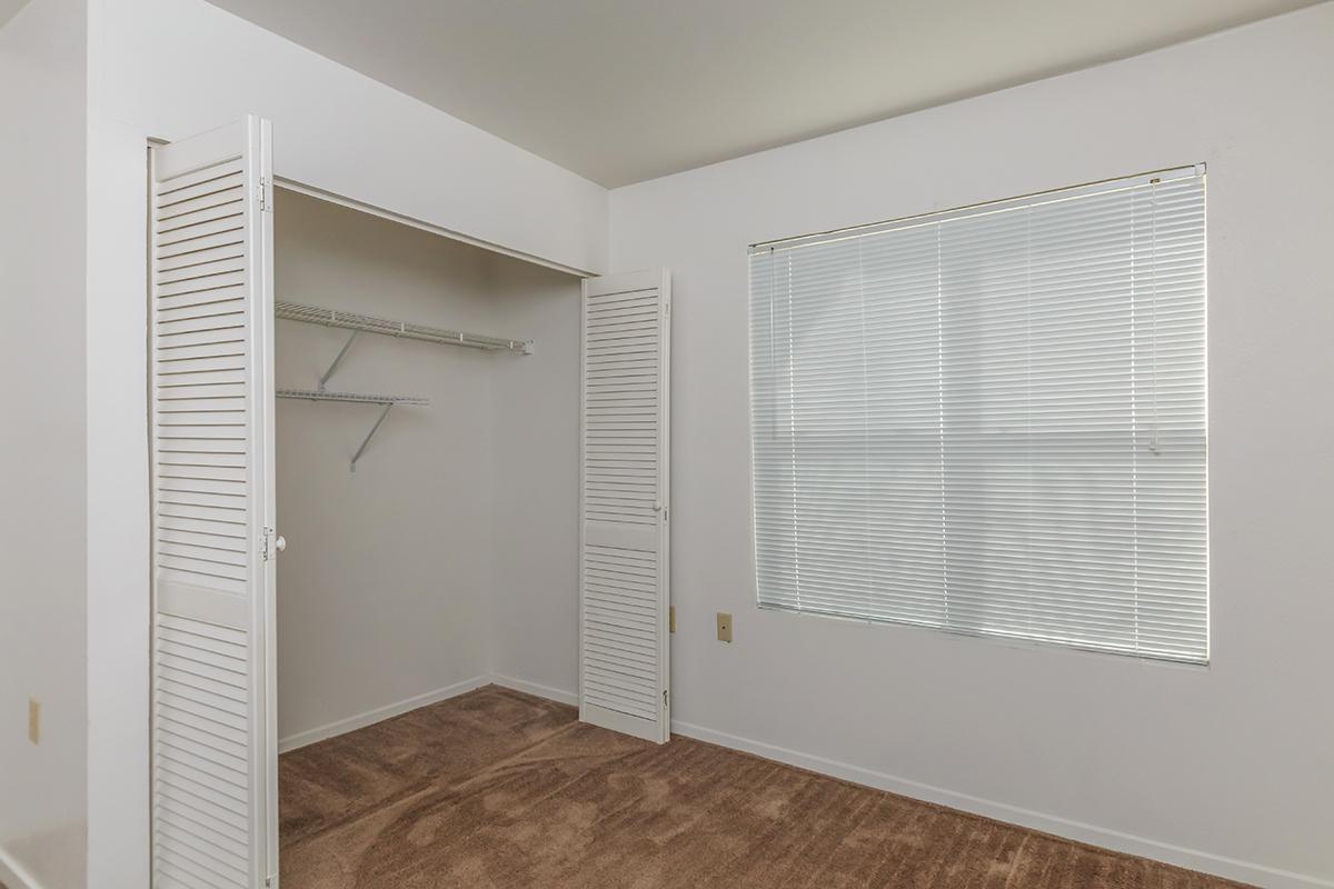 a white refrigerator freezer sitting in a room