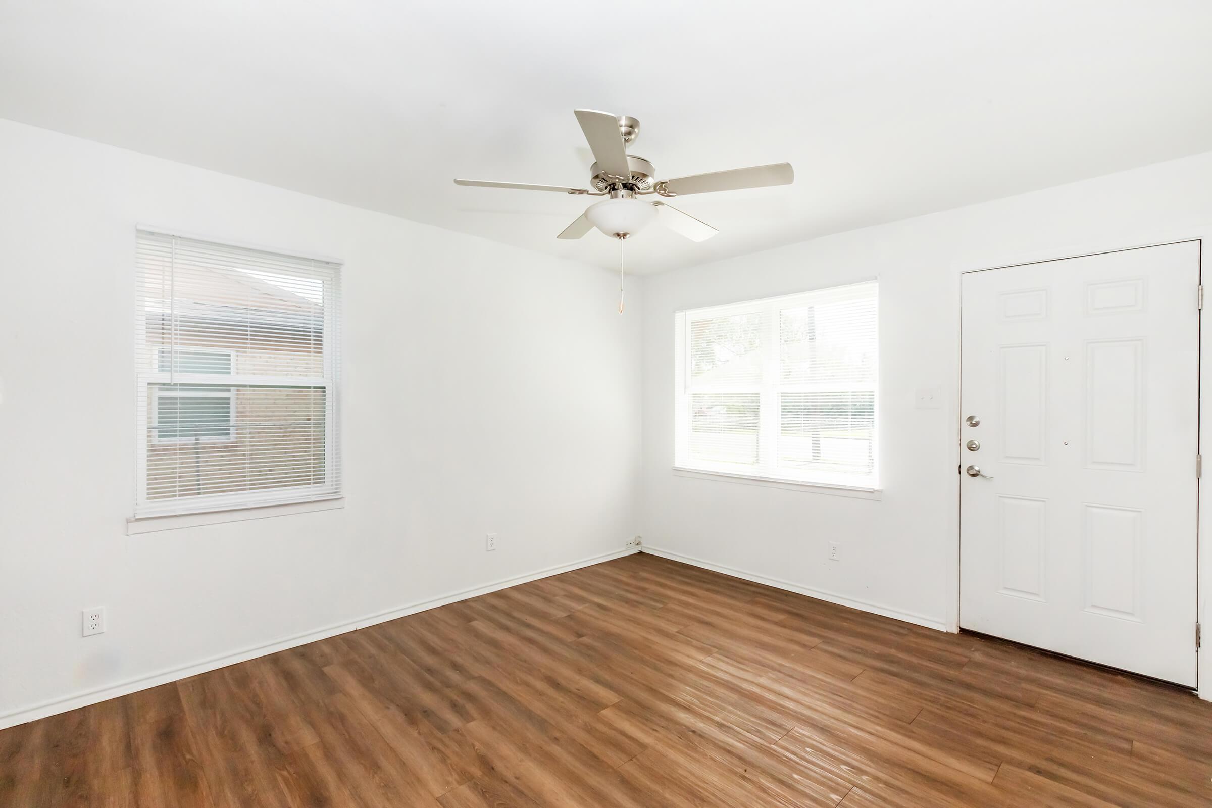 a kitchen with a wood floor