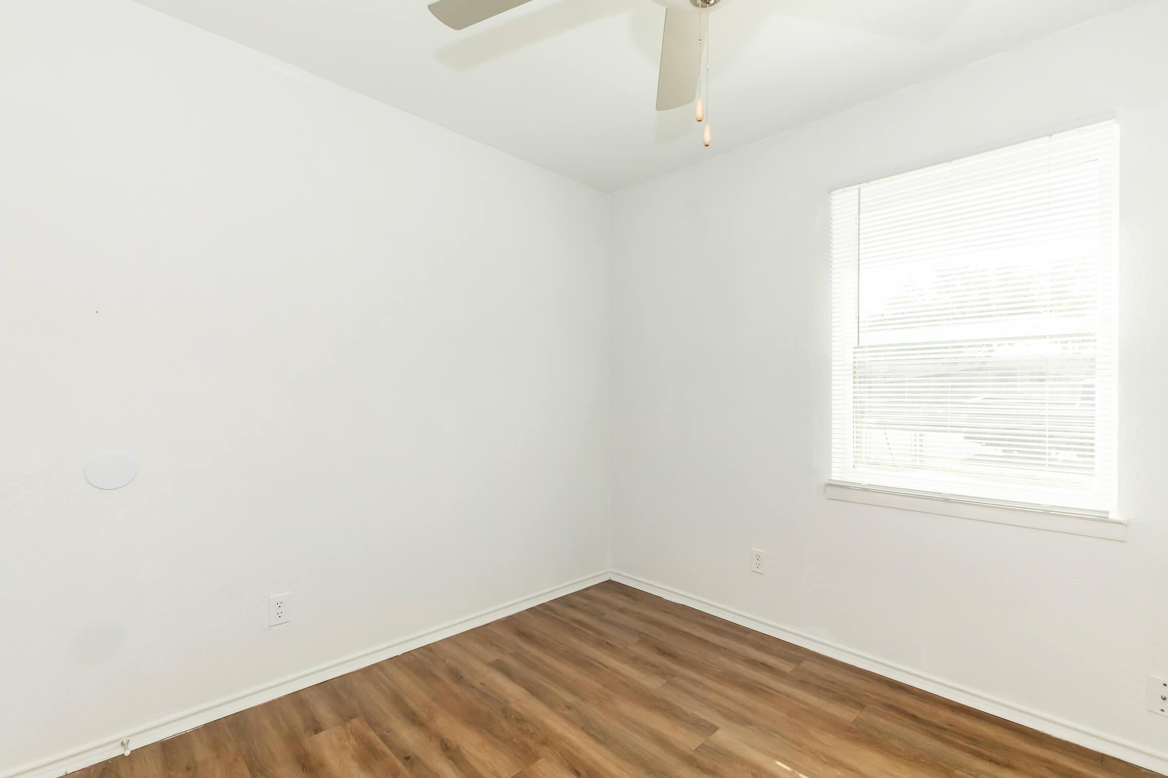 a room with a sink and a window