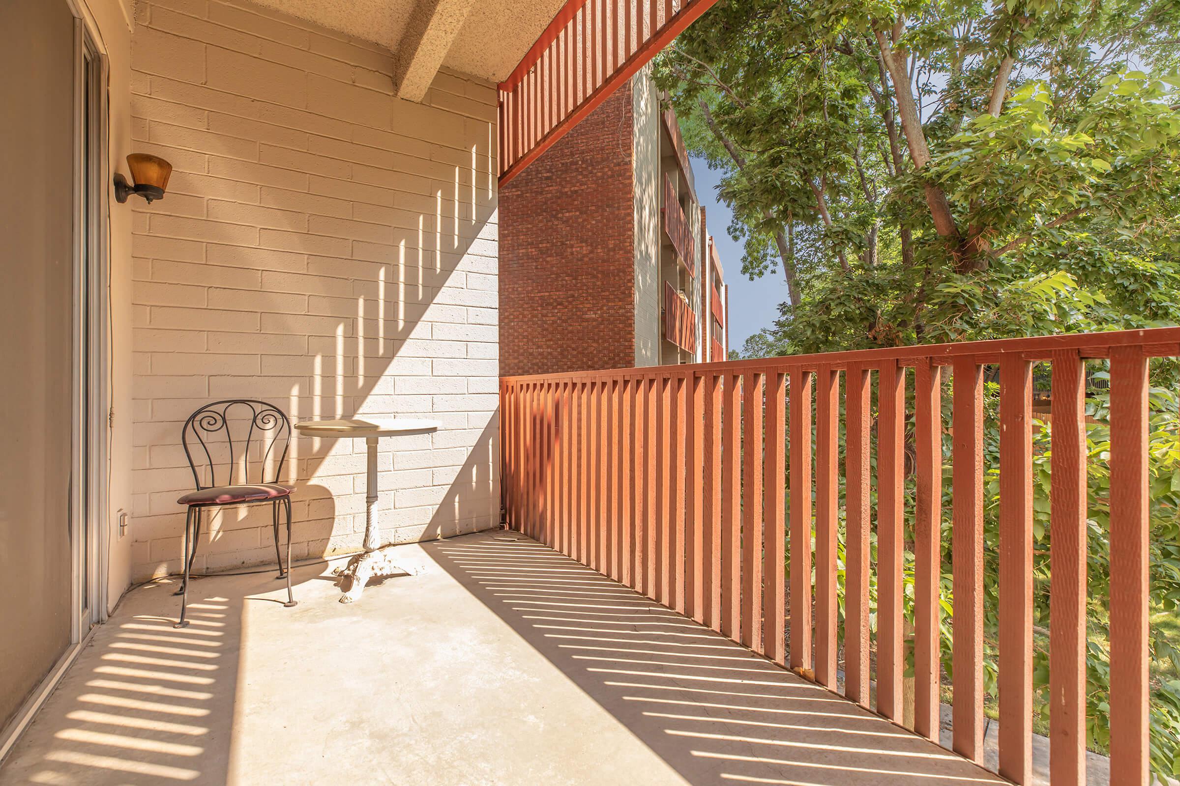 patio with a chair and table