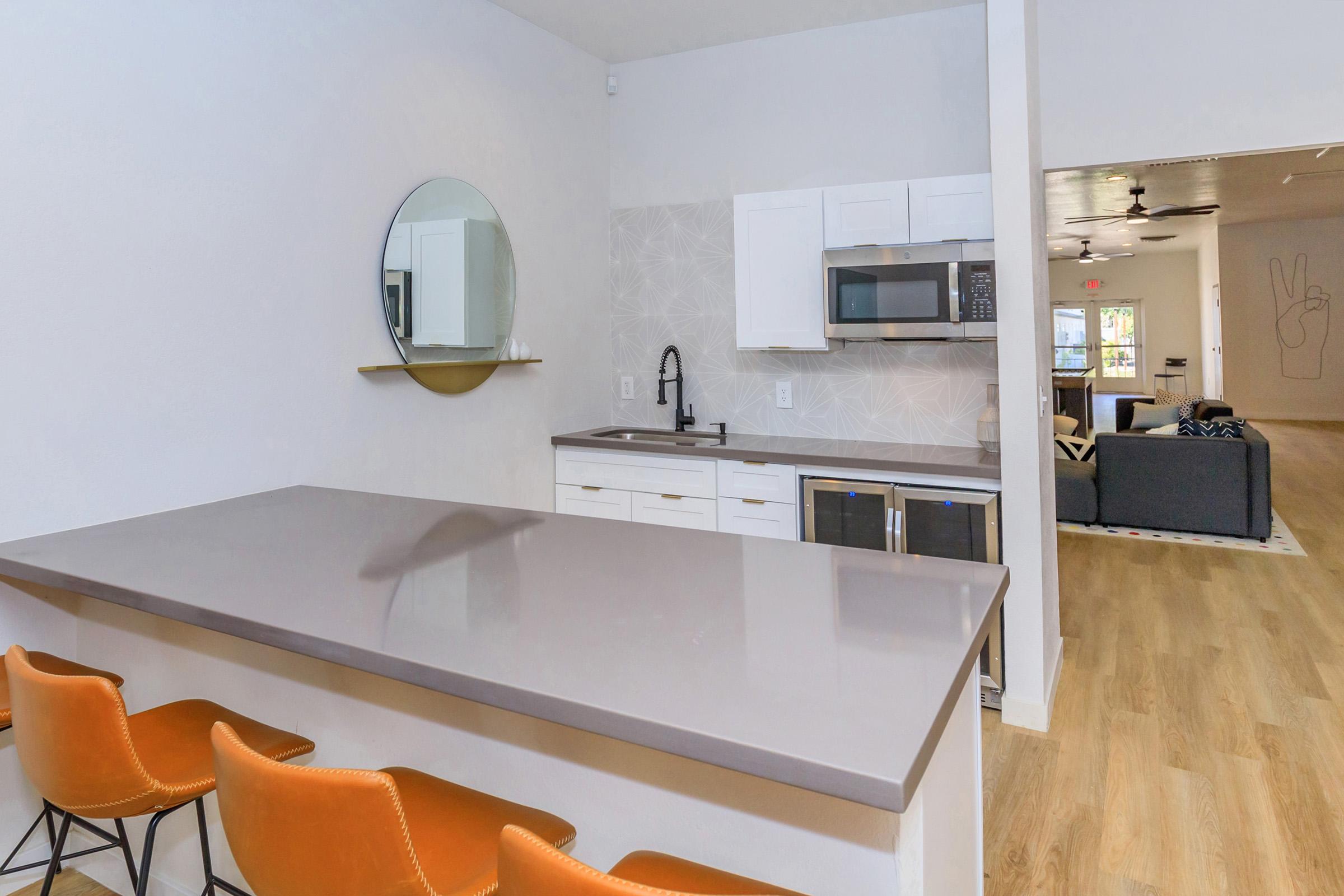 a kitchen with a table in a room