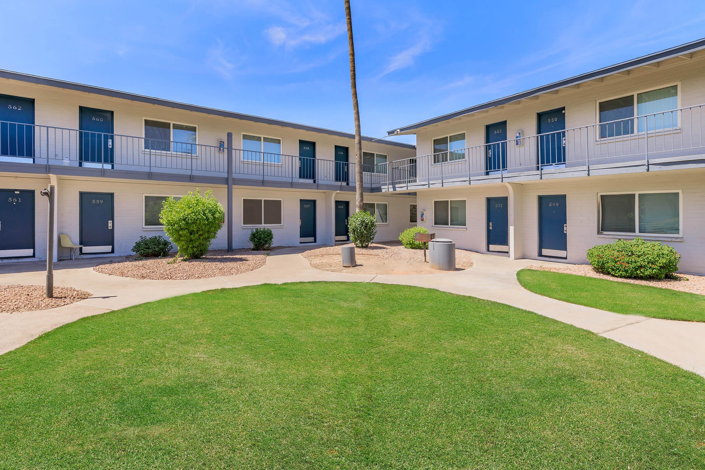 a large lawn in front of a building