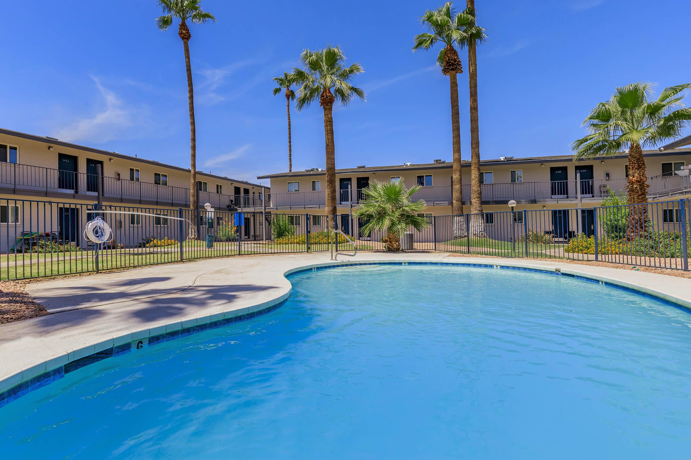 a pool next to a body of water