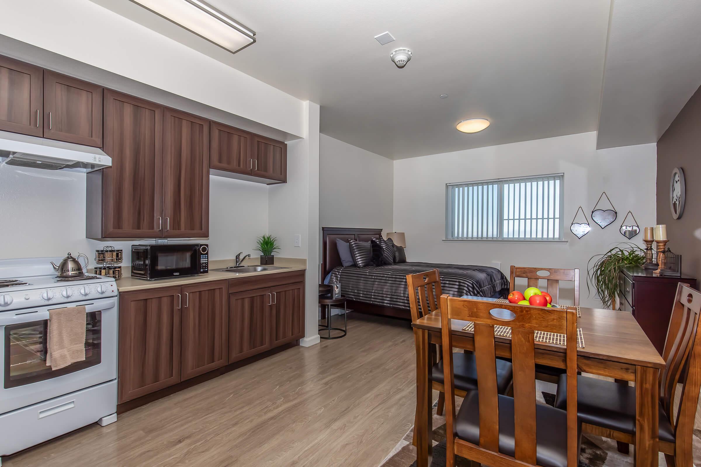 a kitchen with a dining room table