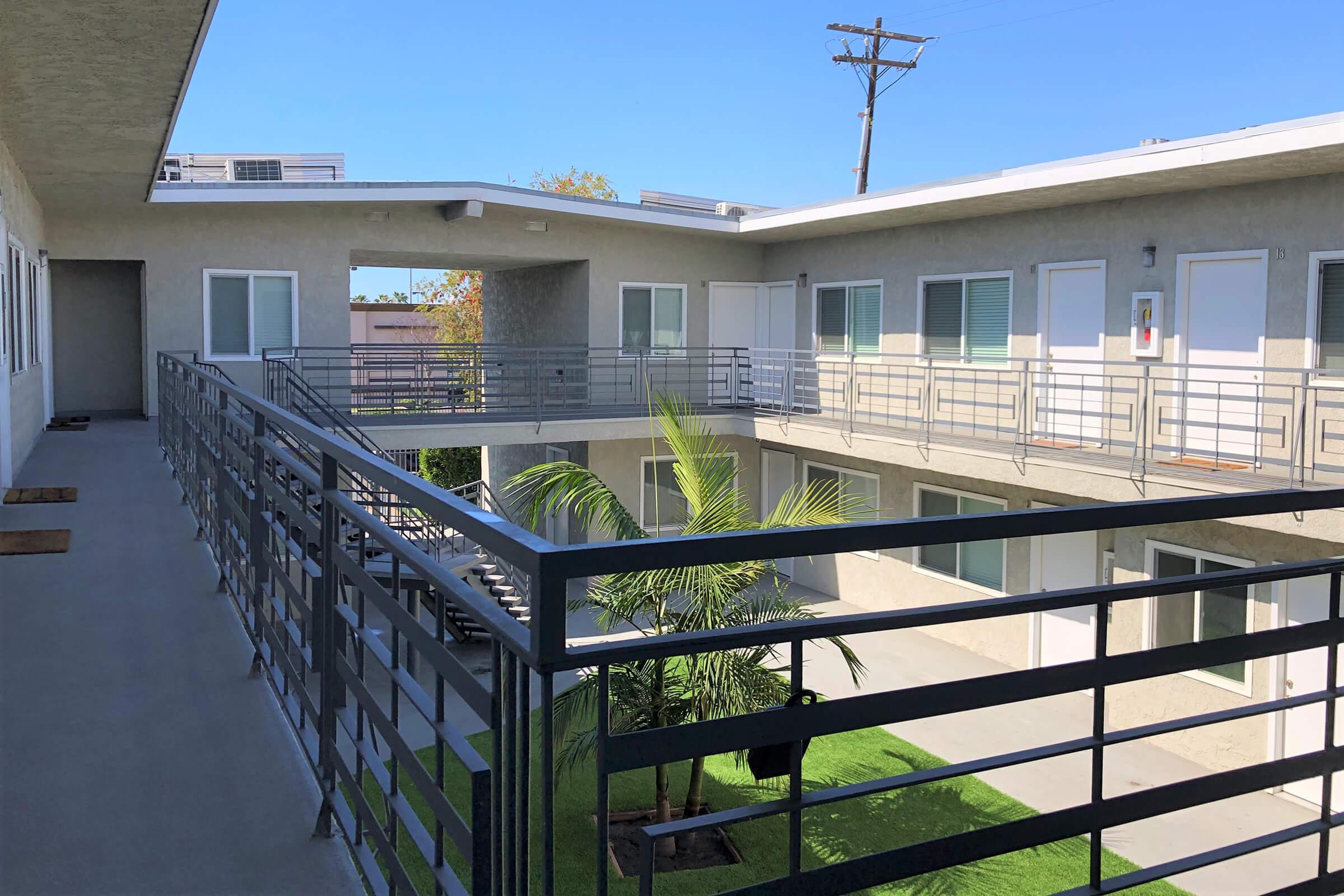 a building with a metal fence