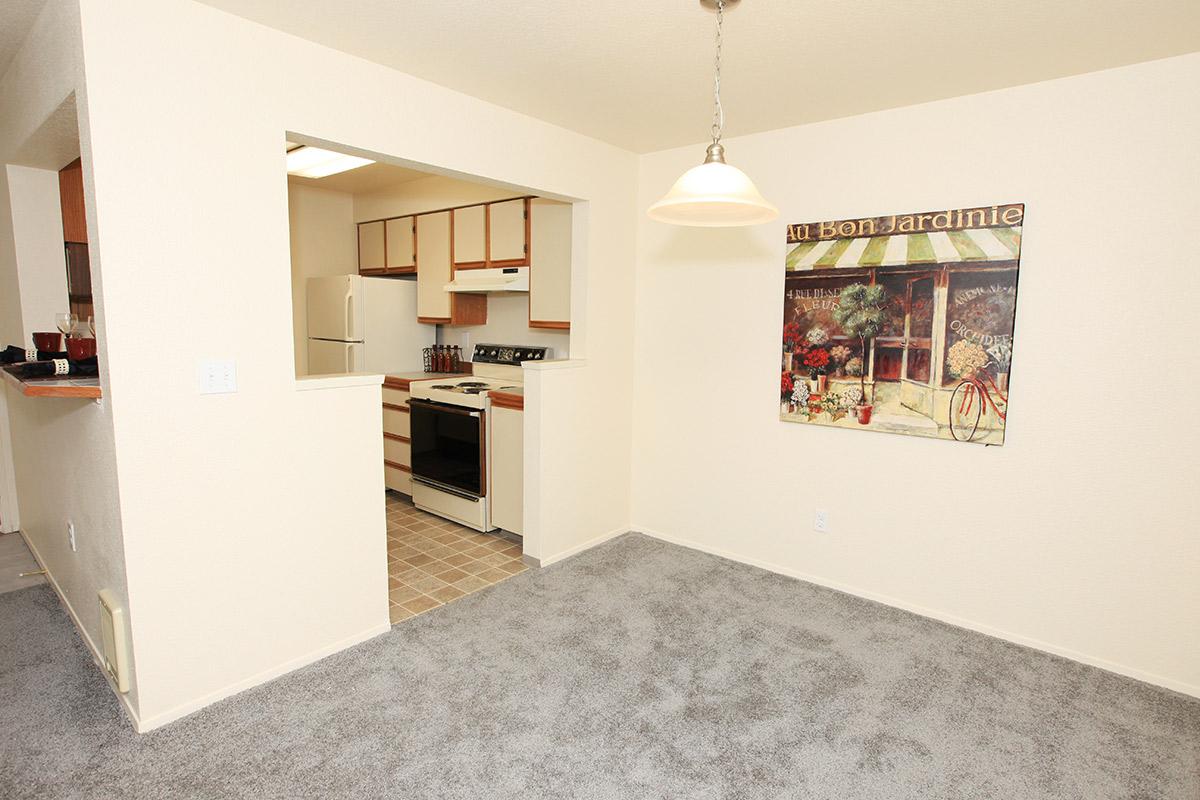 a white refrigerator freezer sitting in a living room