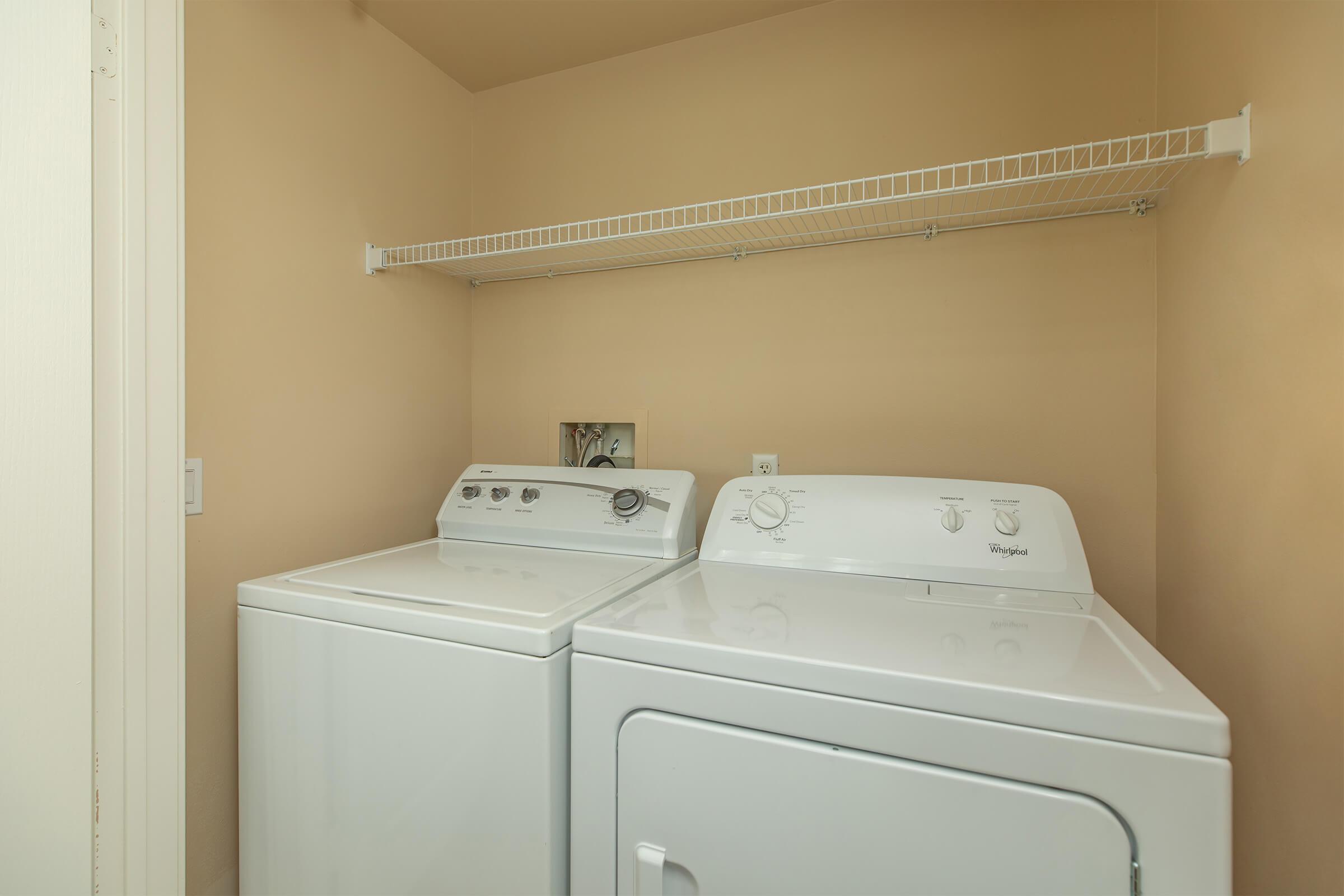 washer and dryer in the community laundry closet