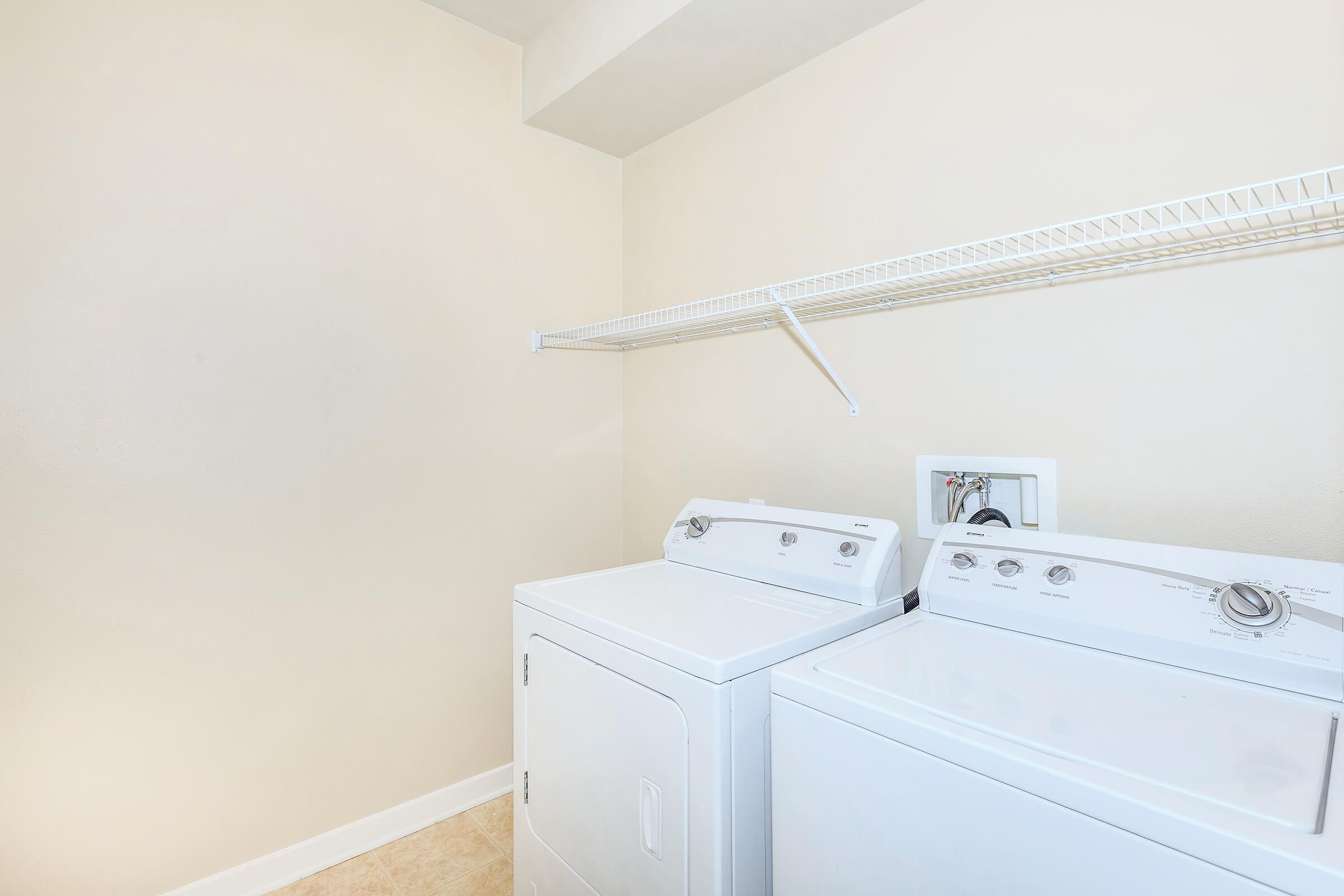 Unfurnished washer and dryer in the laundry closet