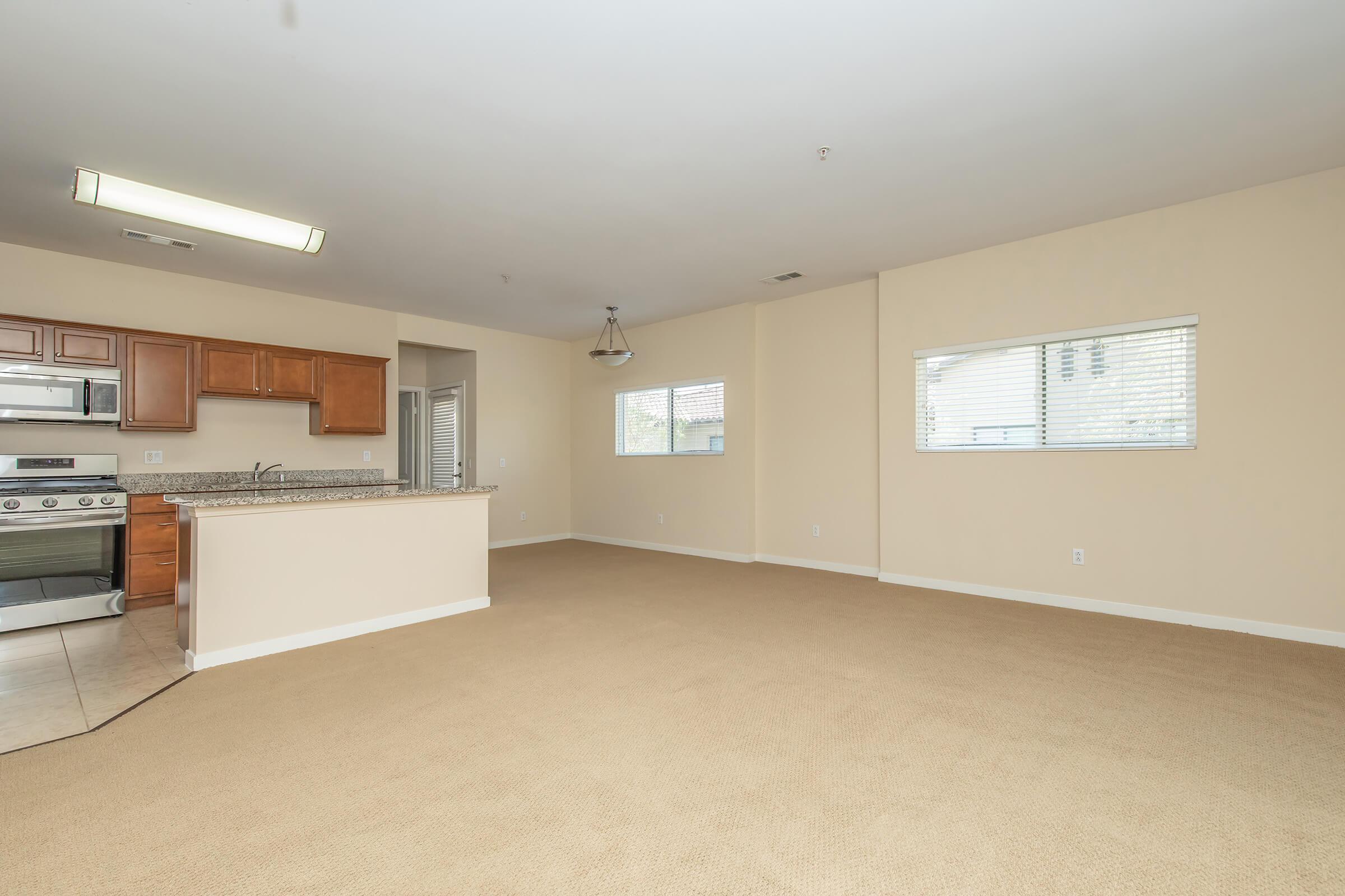 a vacant apartment with carpet