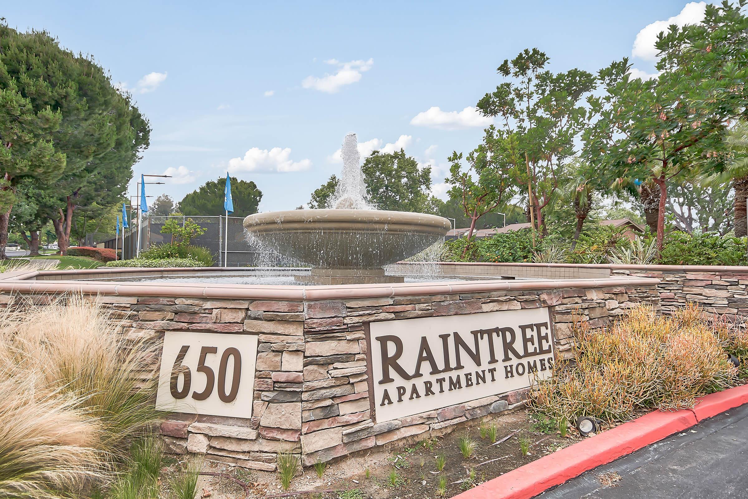Raintree Apartment Homes monument sign with water feature