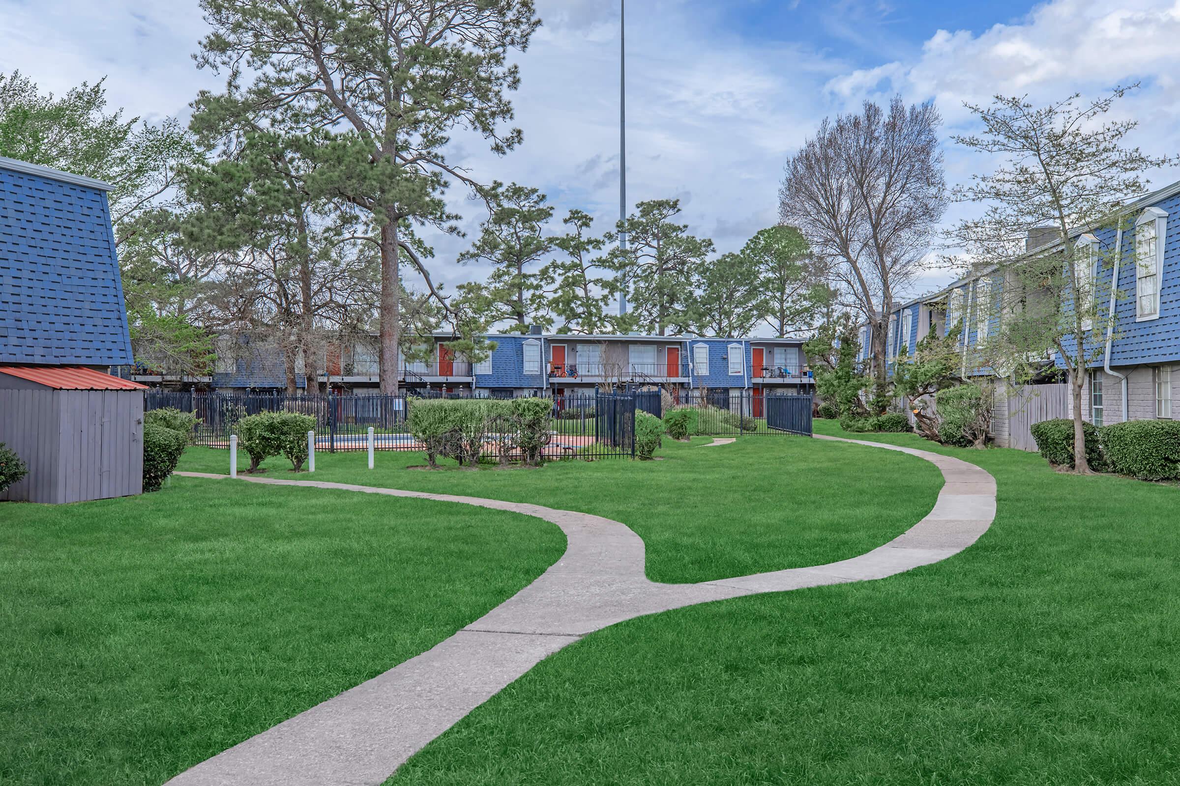 a large lawn in front of a house