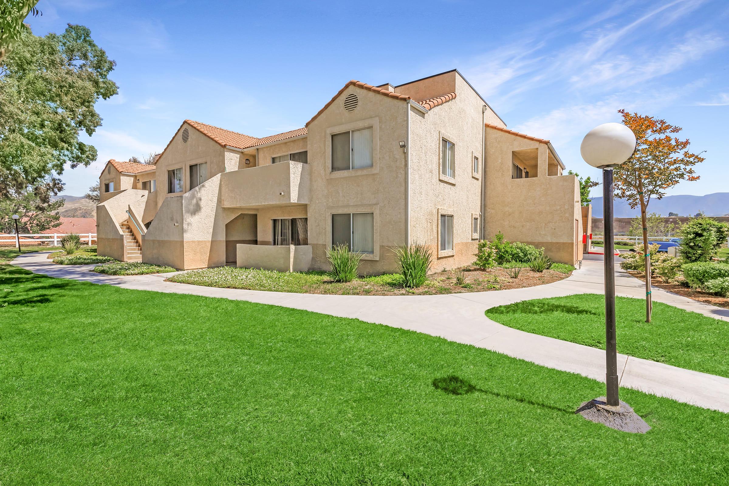 a large lawn in front of a house