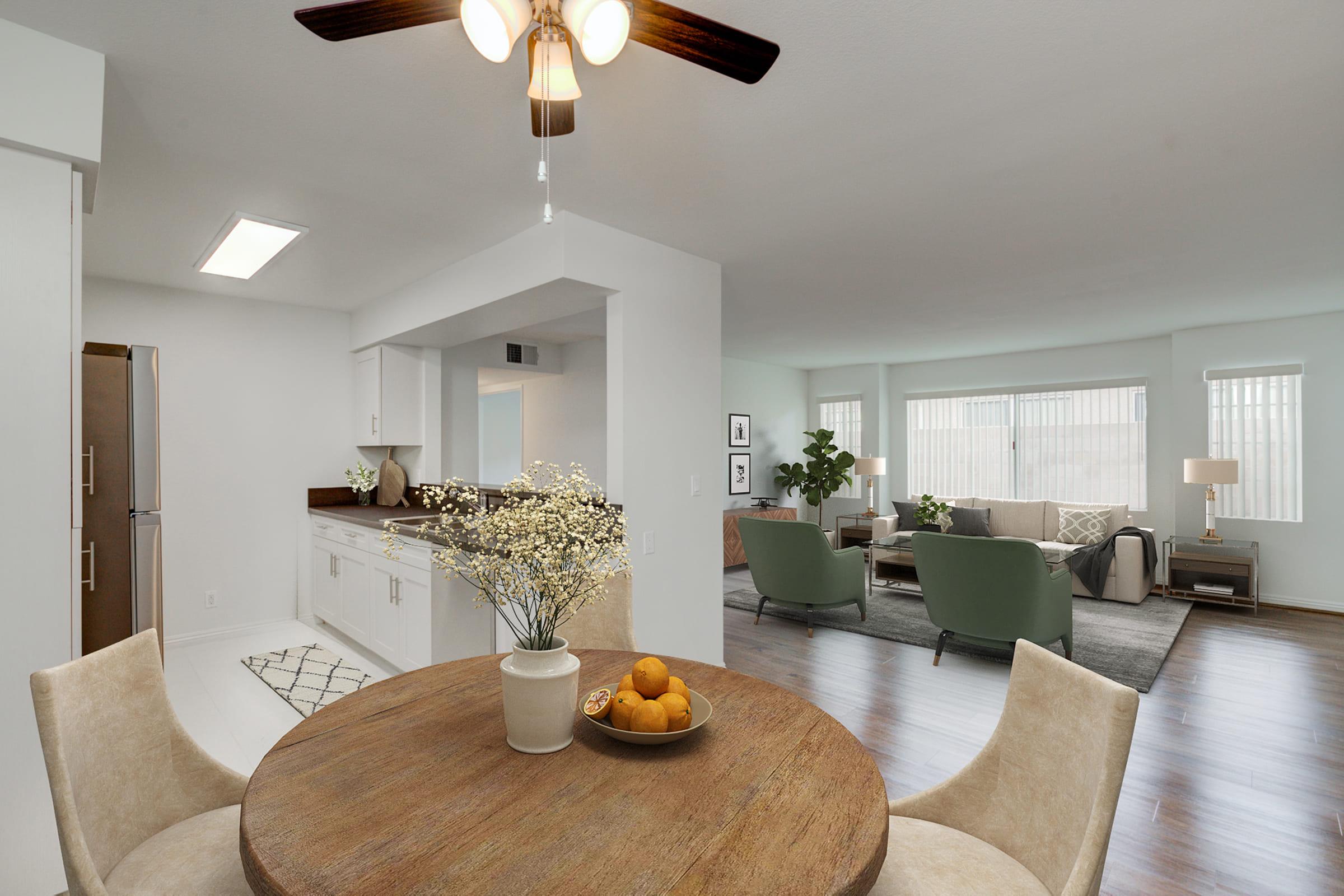 a living room filled with furniture and a table