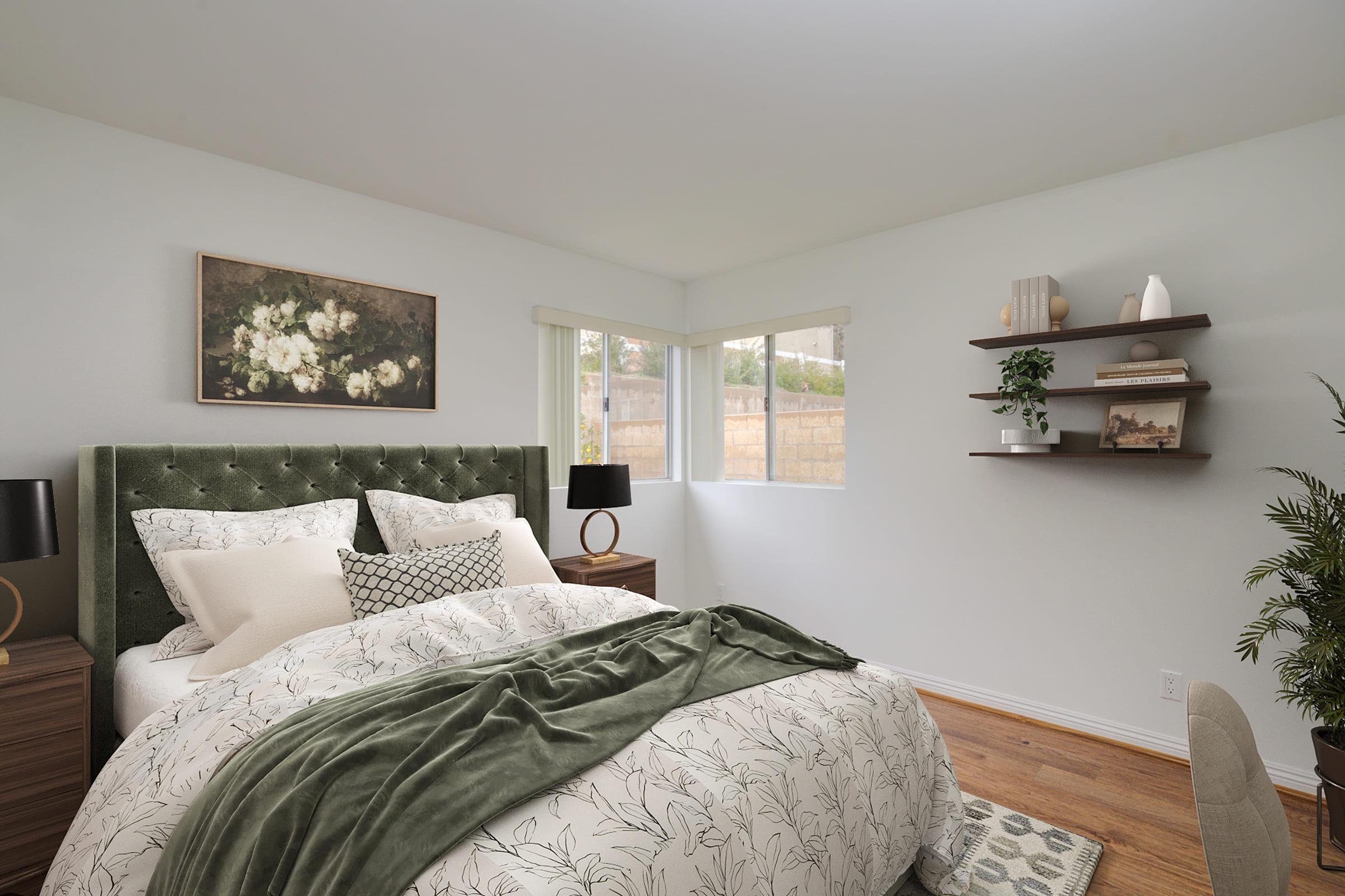 a bedroom with a large bed in a room