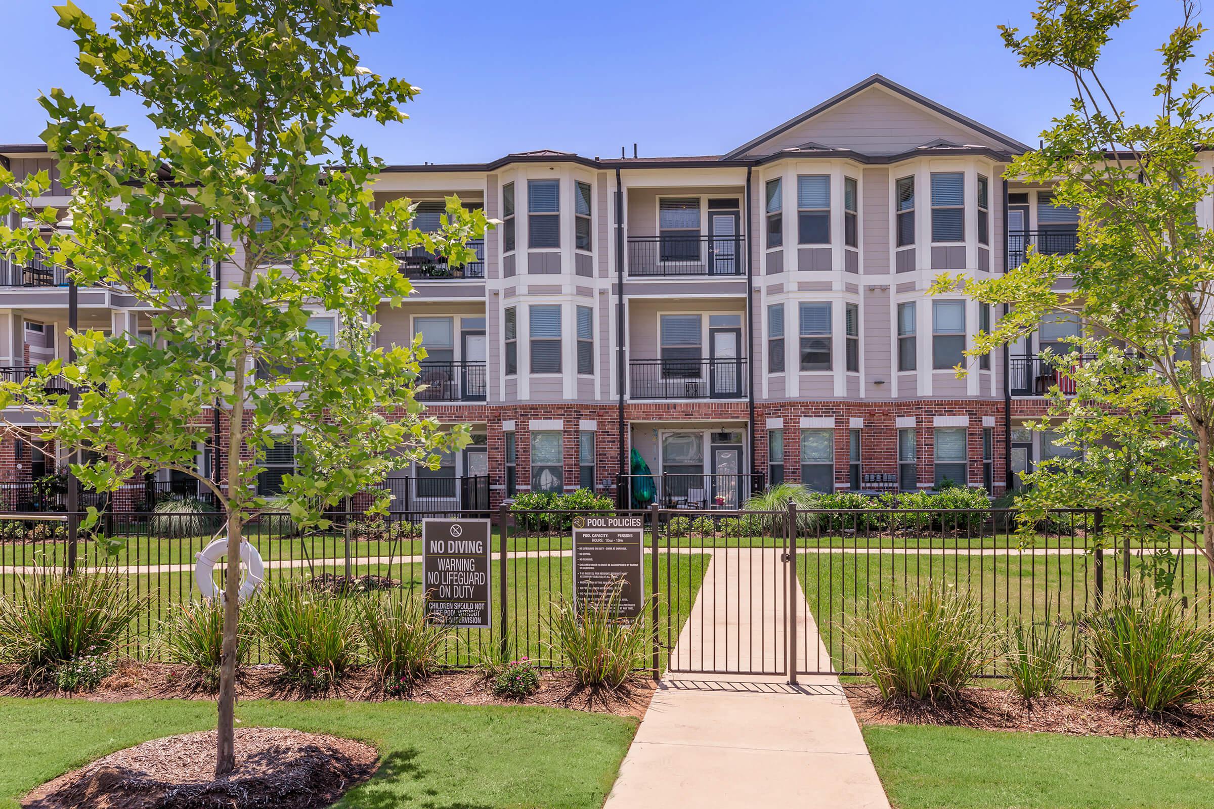 a large lawn in front of a building