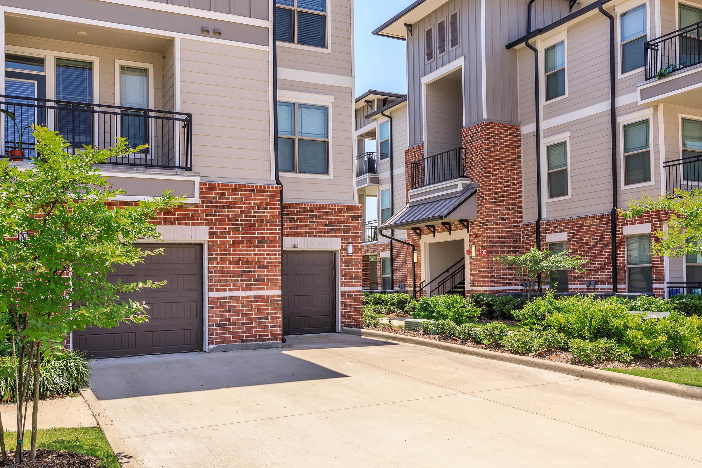 a close up of a street in front of a brick building