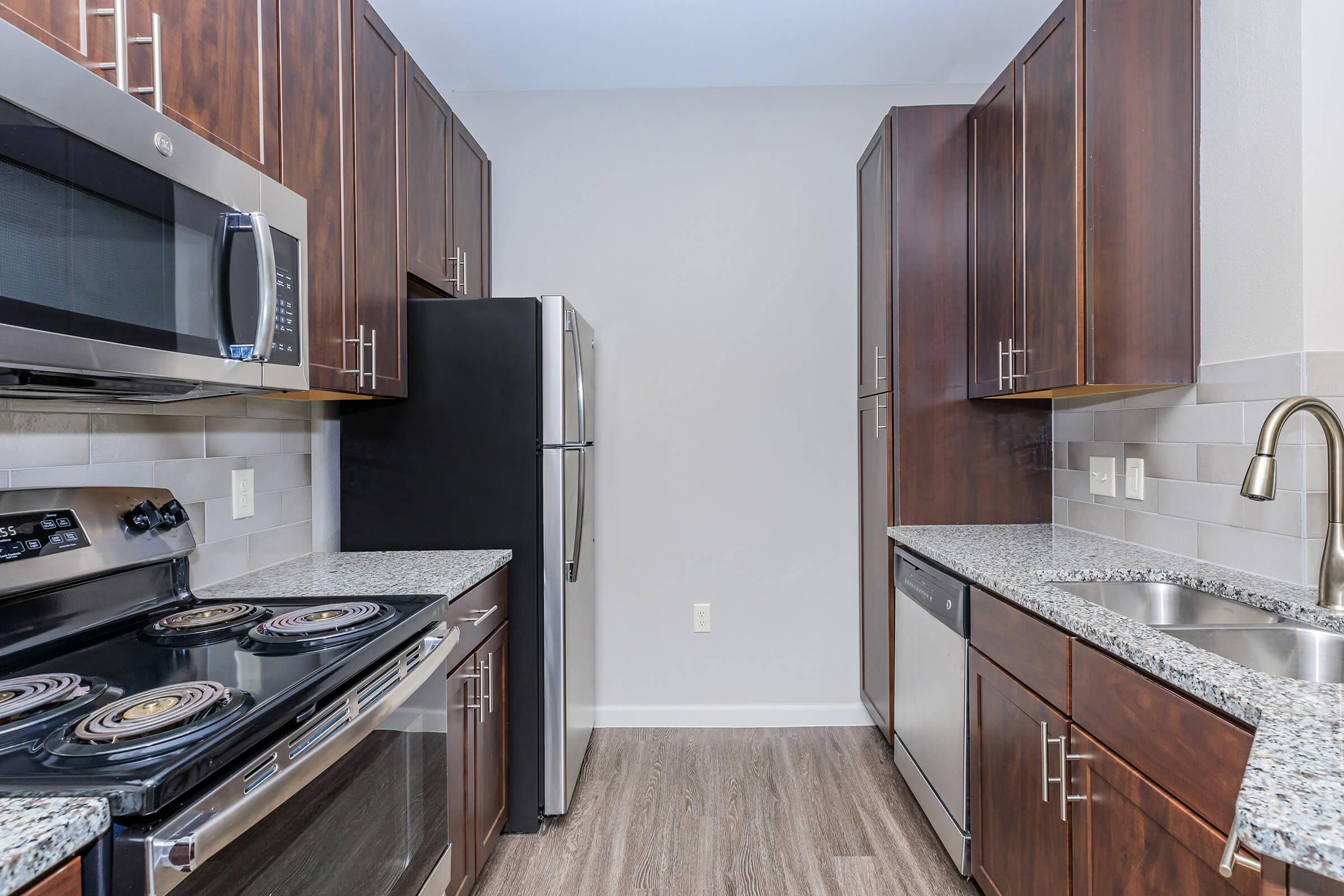 a modern kitchen with stainless steel appliances