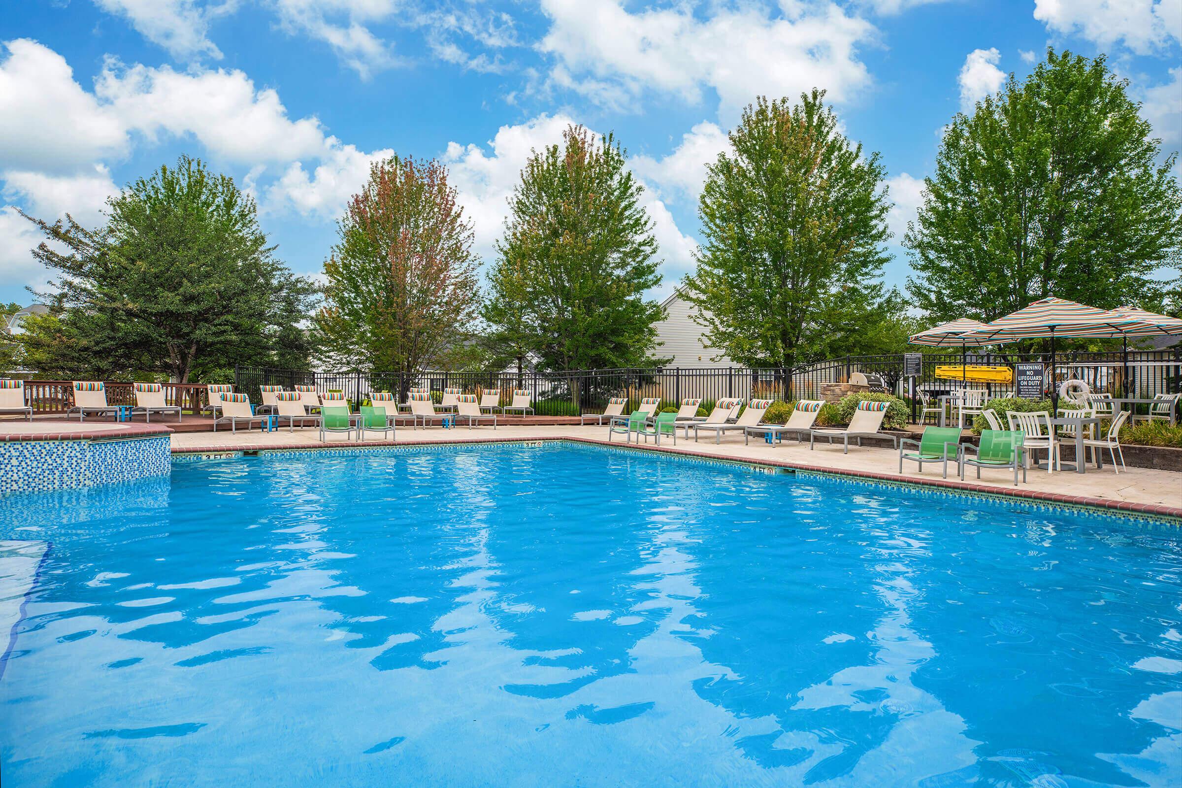 a pool next to a body of water