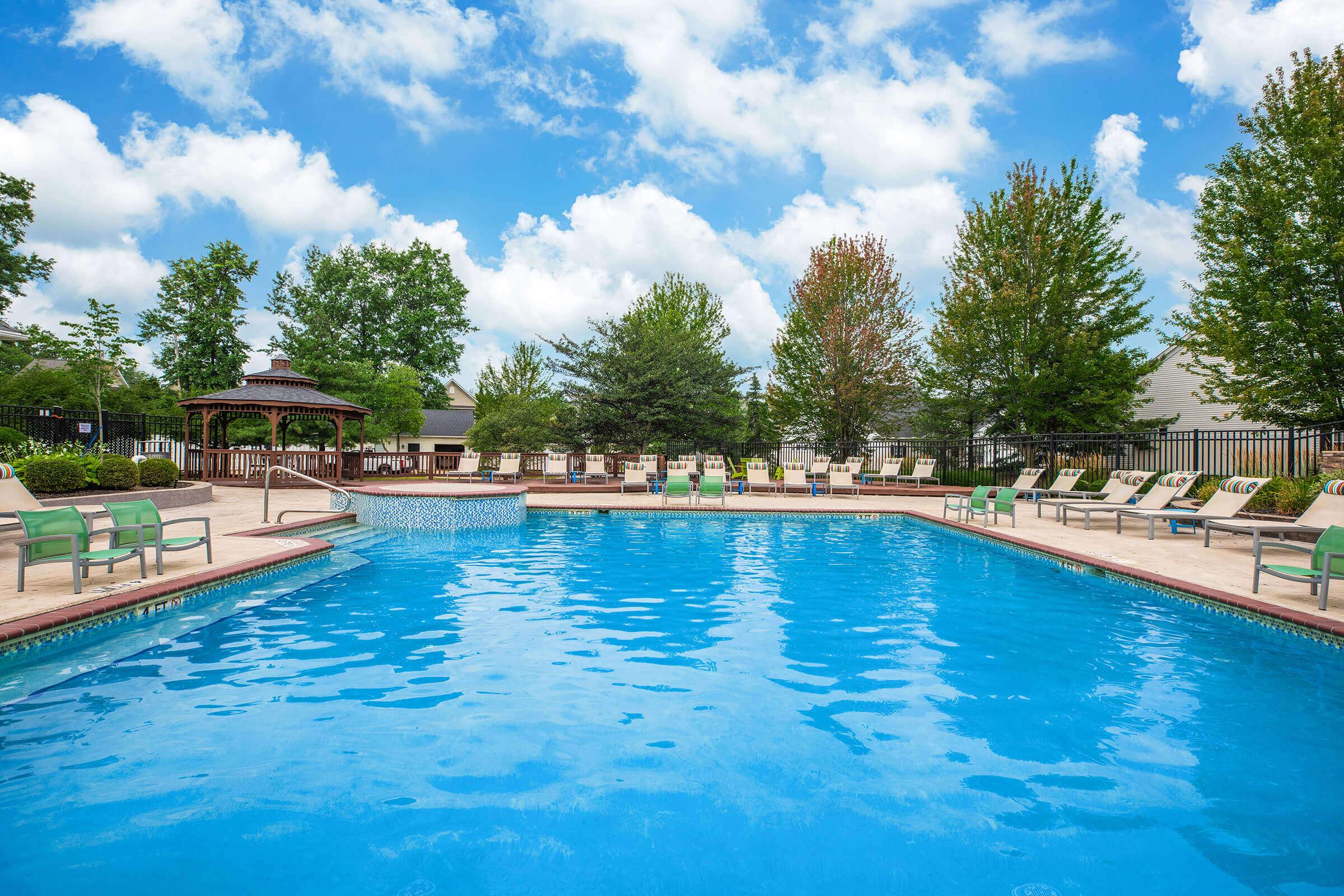 a pool next to a body of water