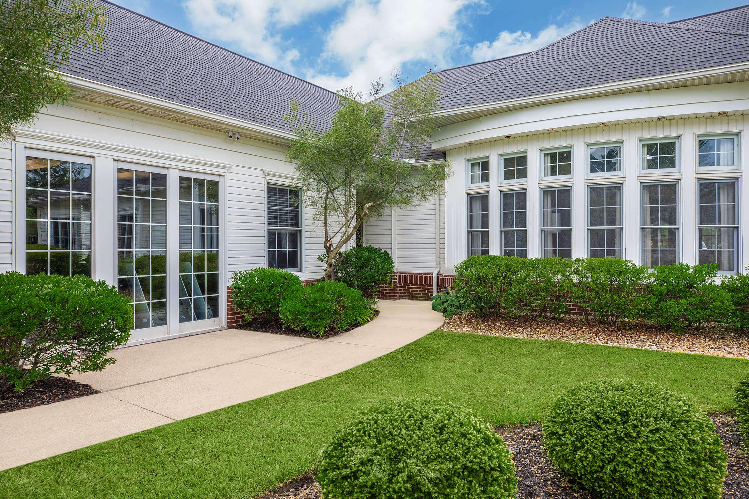 a large lawn in front of a house