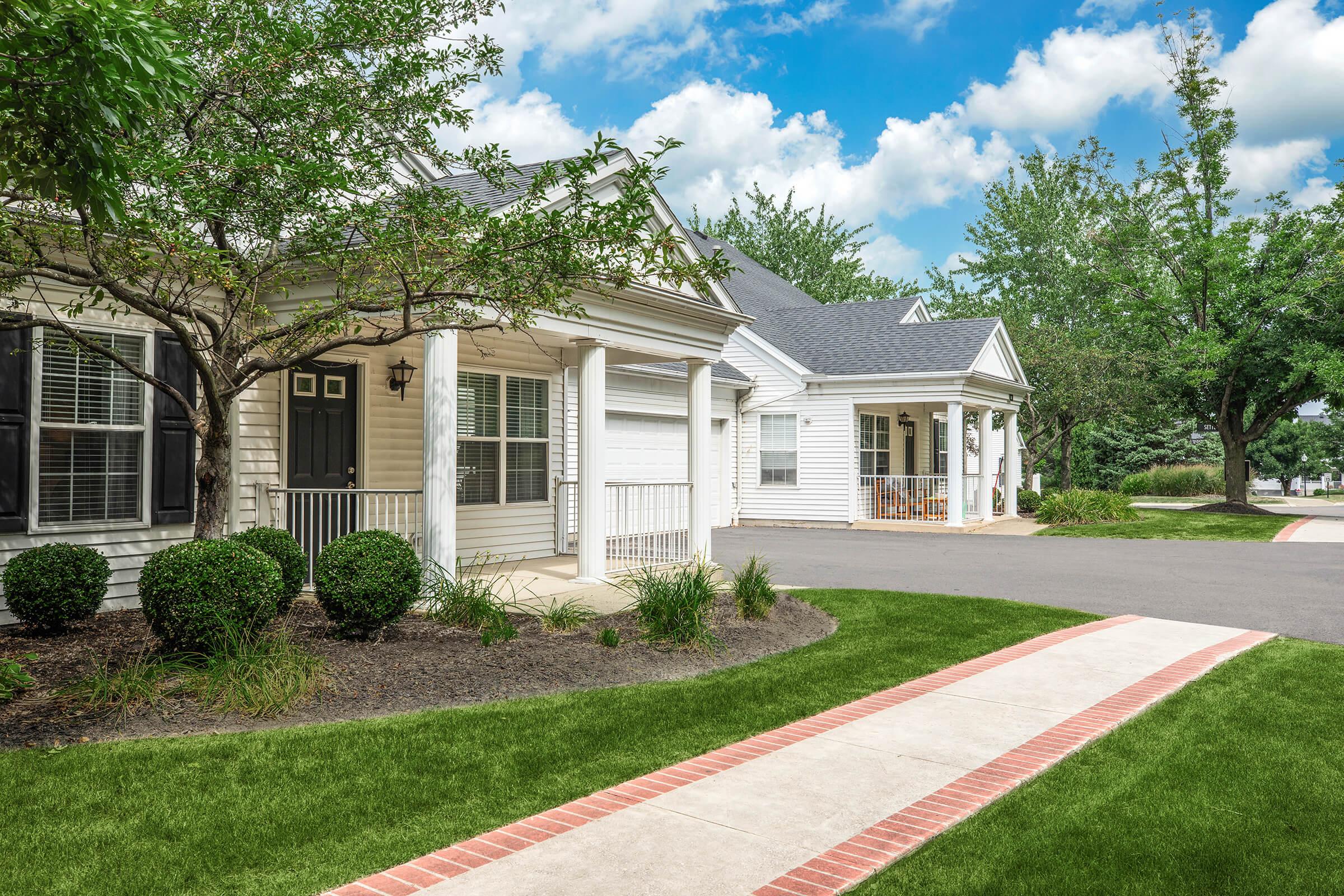 a large lawn in front of a house