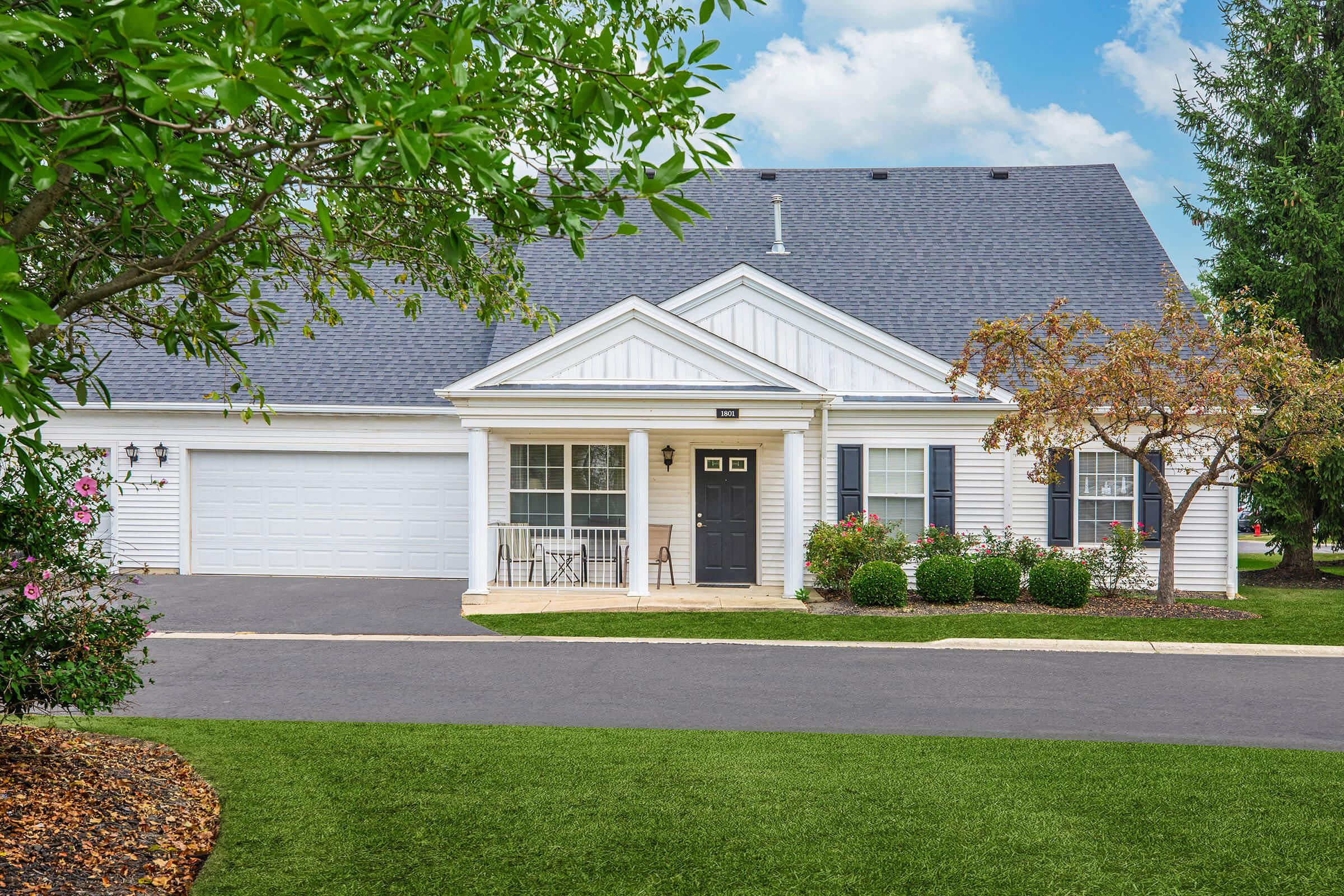 a large lawn in front of a house