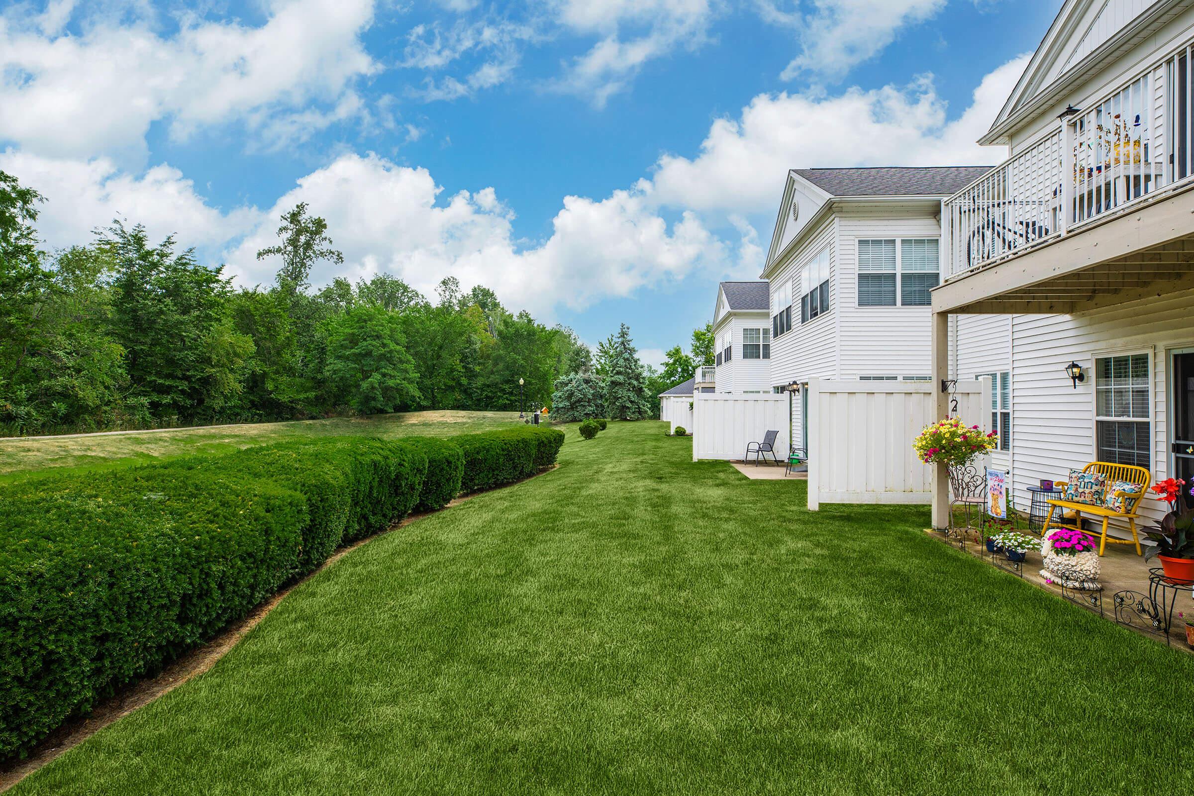 a large lawn in front of a house