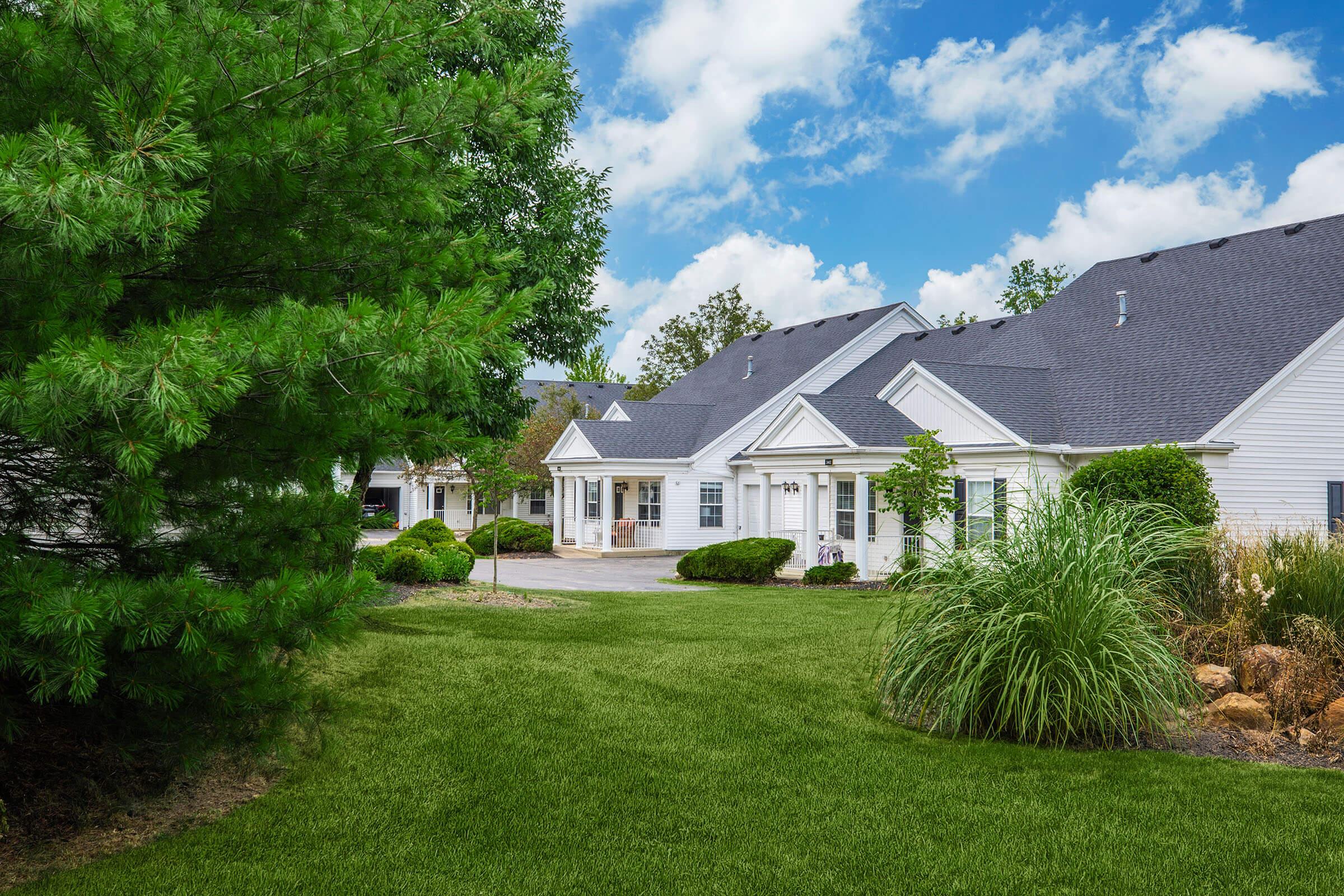 a large lawn in front of a house