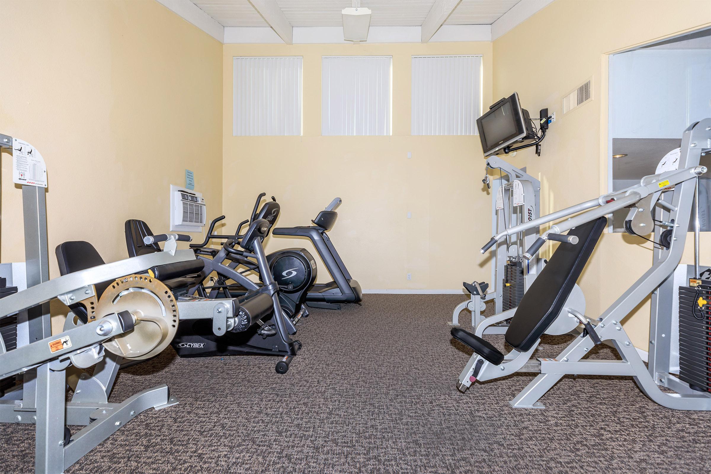 a room filled with furniture and a motorcycle