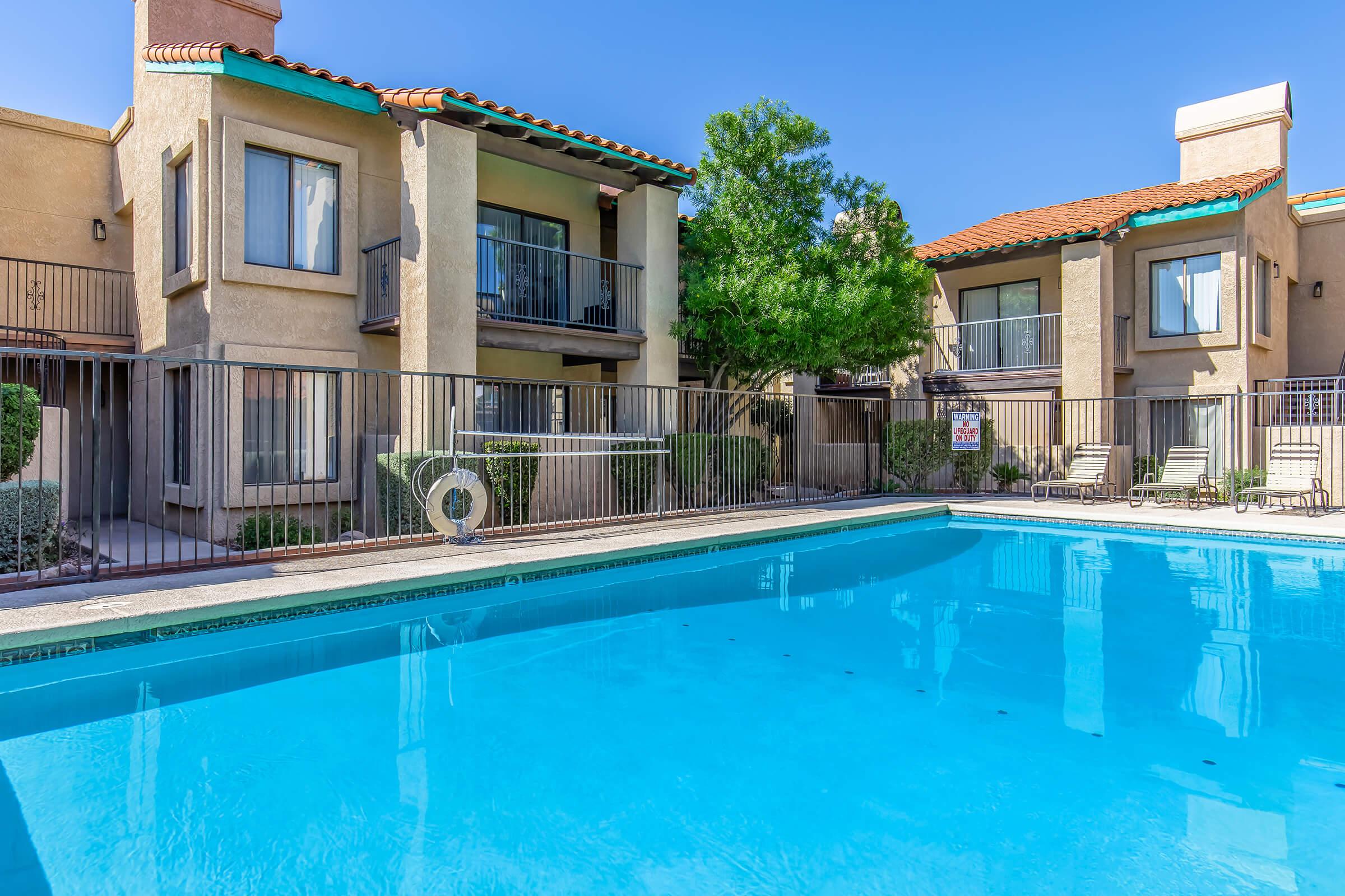 a house with a large pool of water