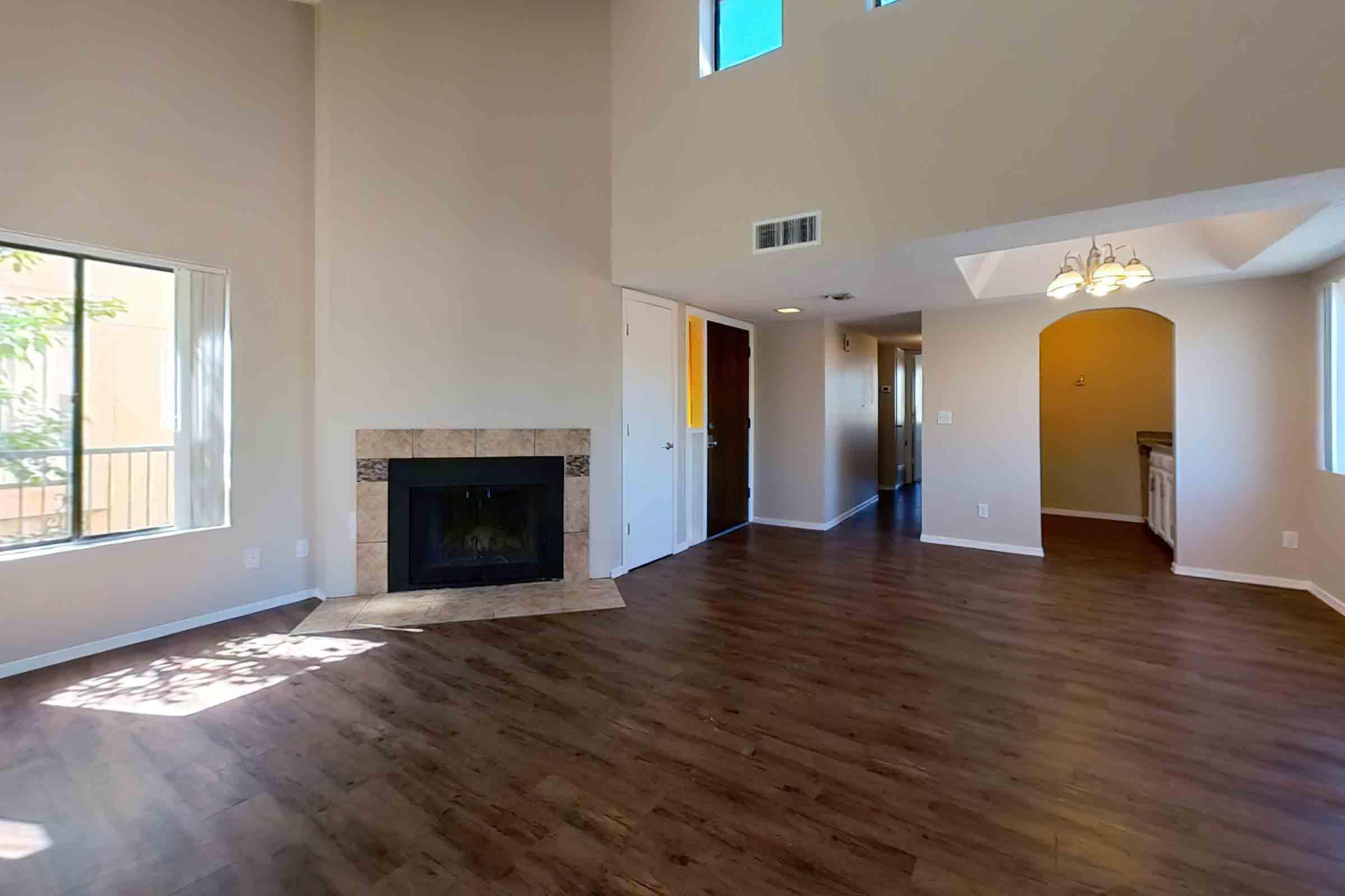 a living room with a wood floor