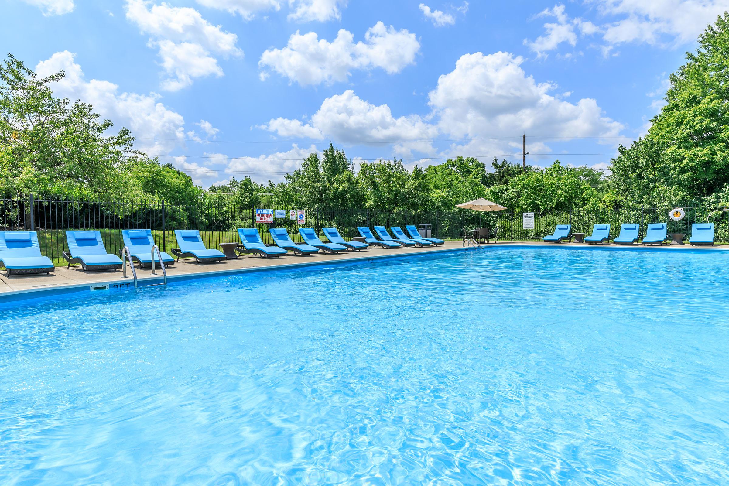 a pool next to a body of water