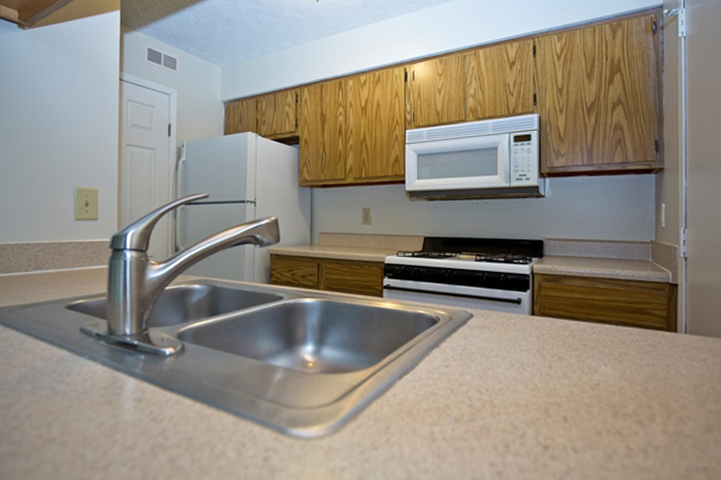 a kitchen with stainless steel appliances