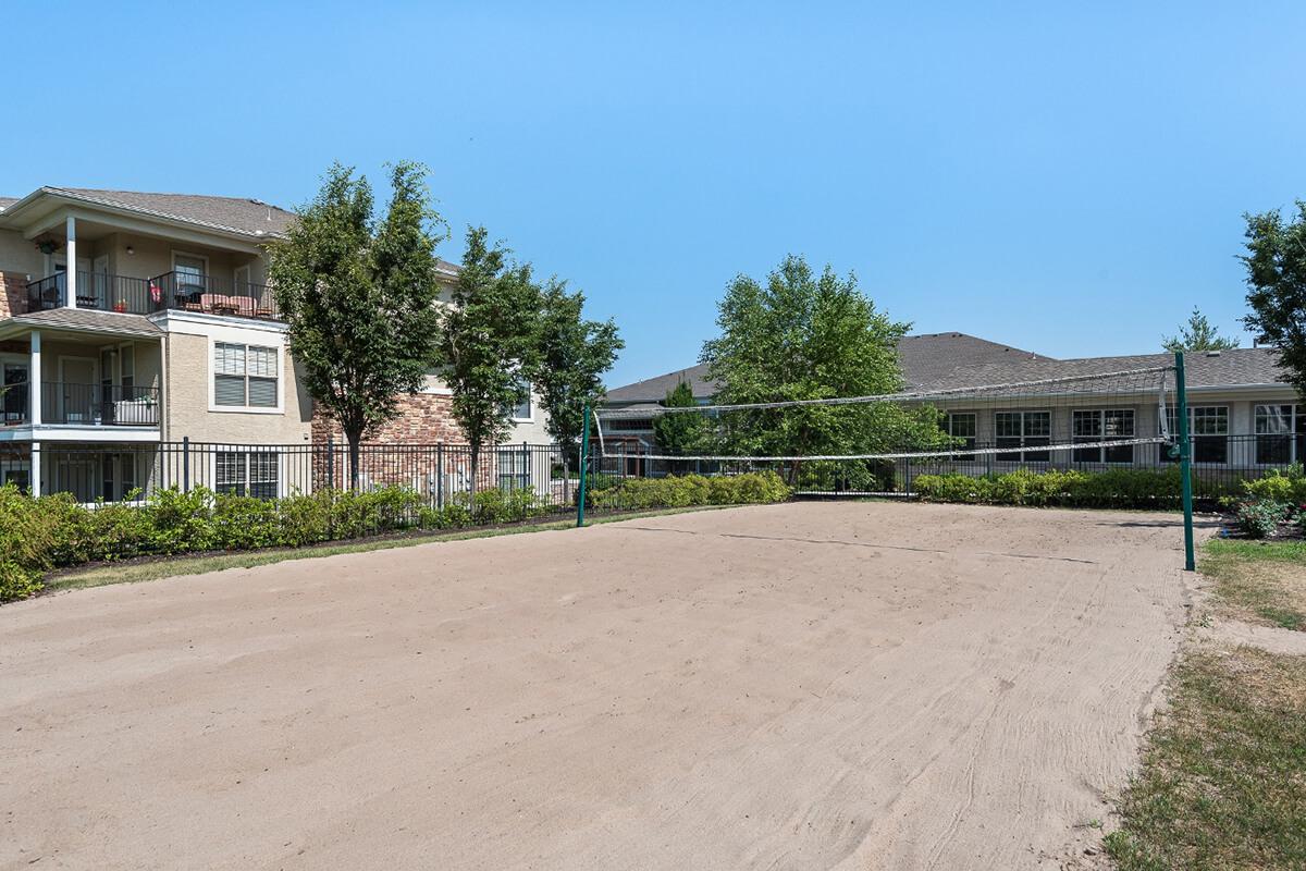 Corbin Crossing Luxury Apartments in Overland Park, KS - Sand Volleyball Court 01.jpg