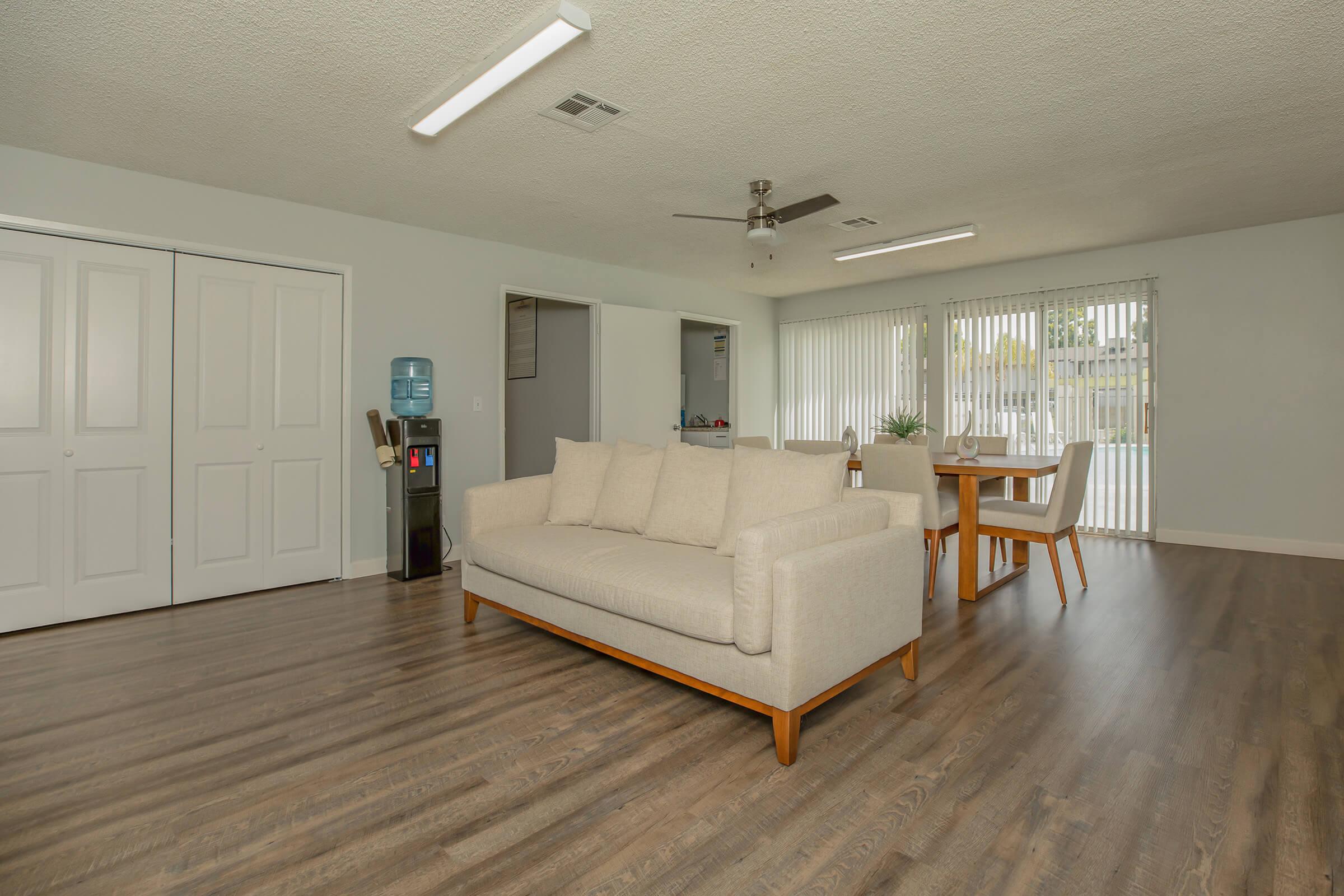 a living room with a wood floor