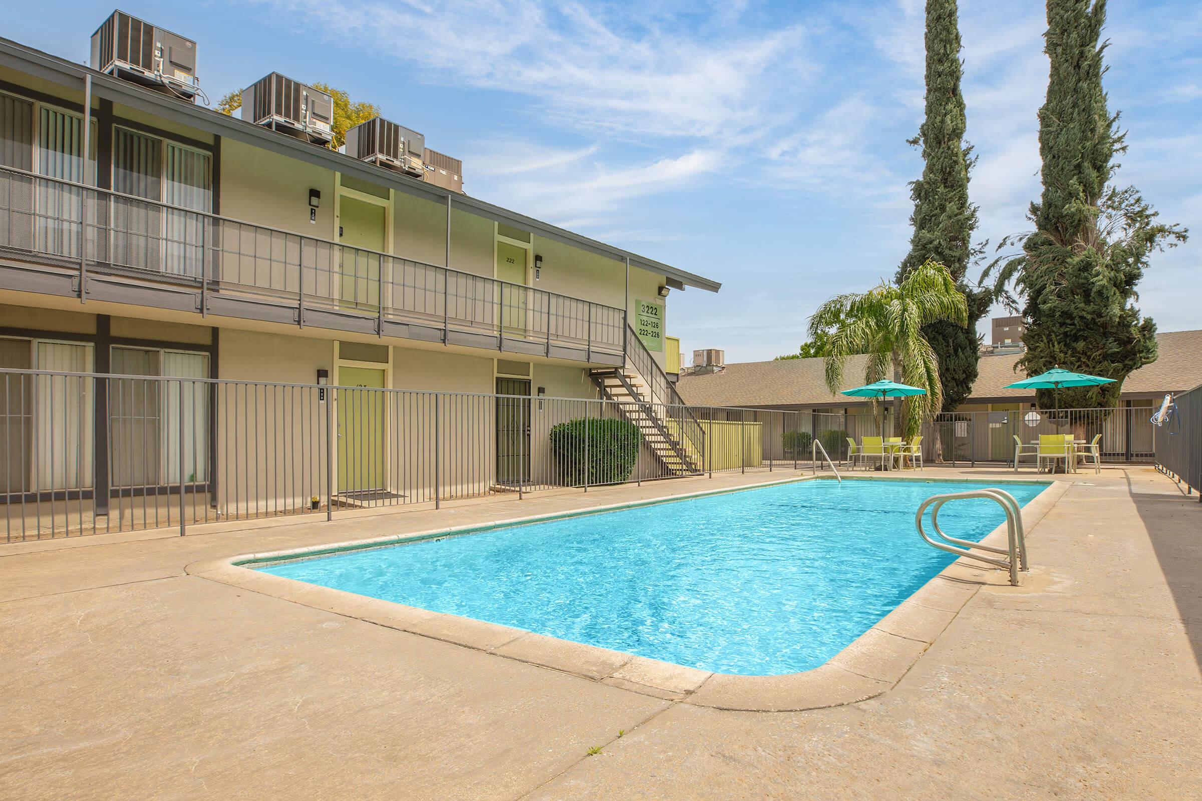 a pool next to a building