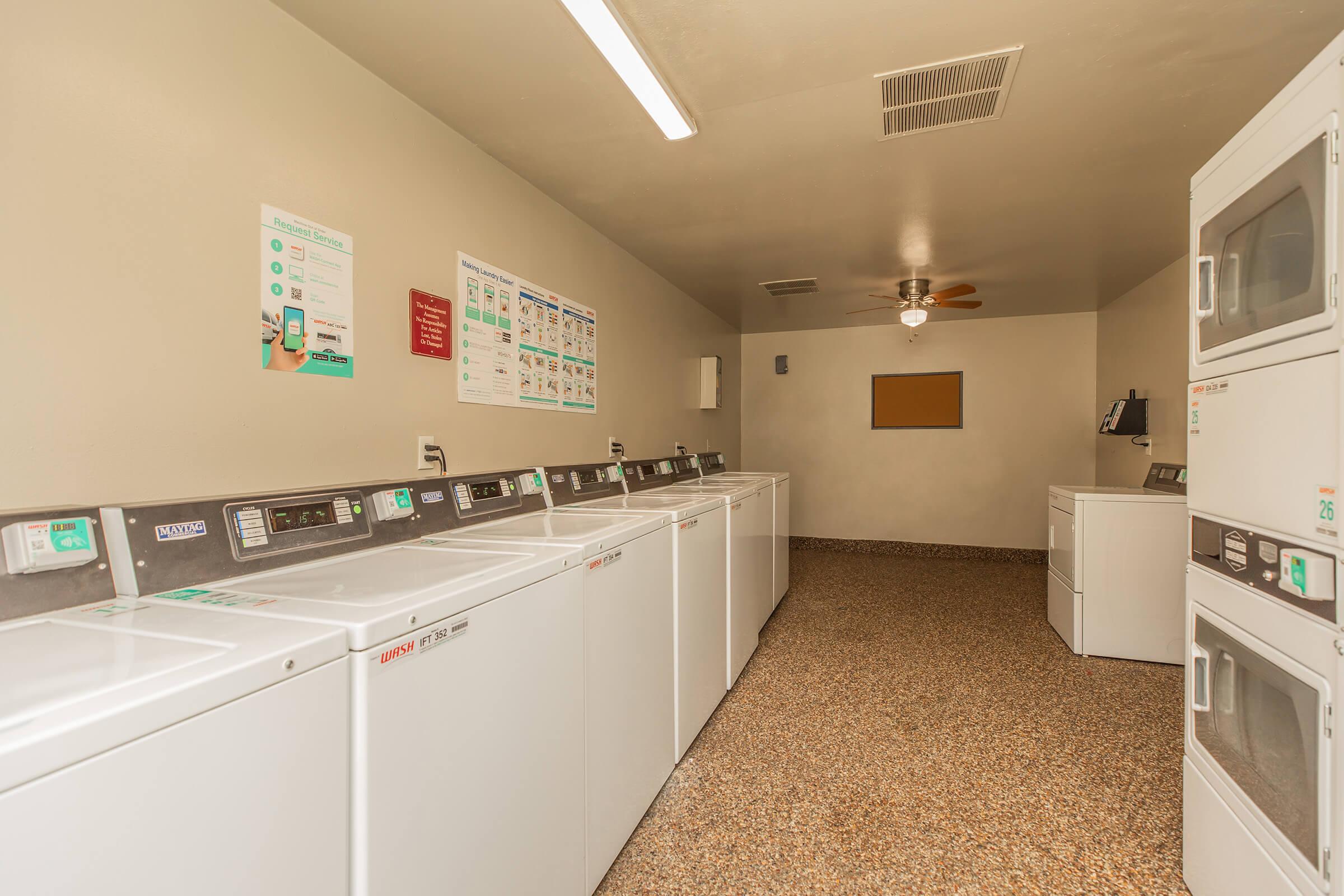 a kitchen with a sink and a refrigerator