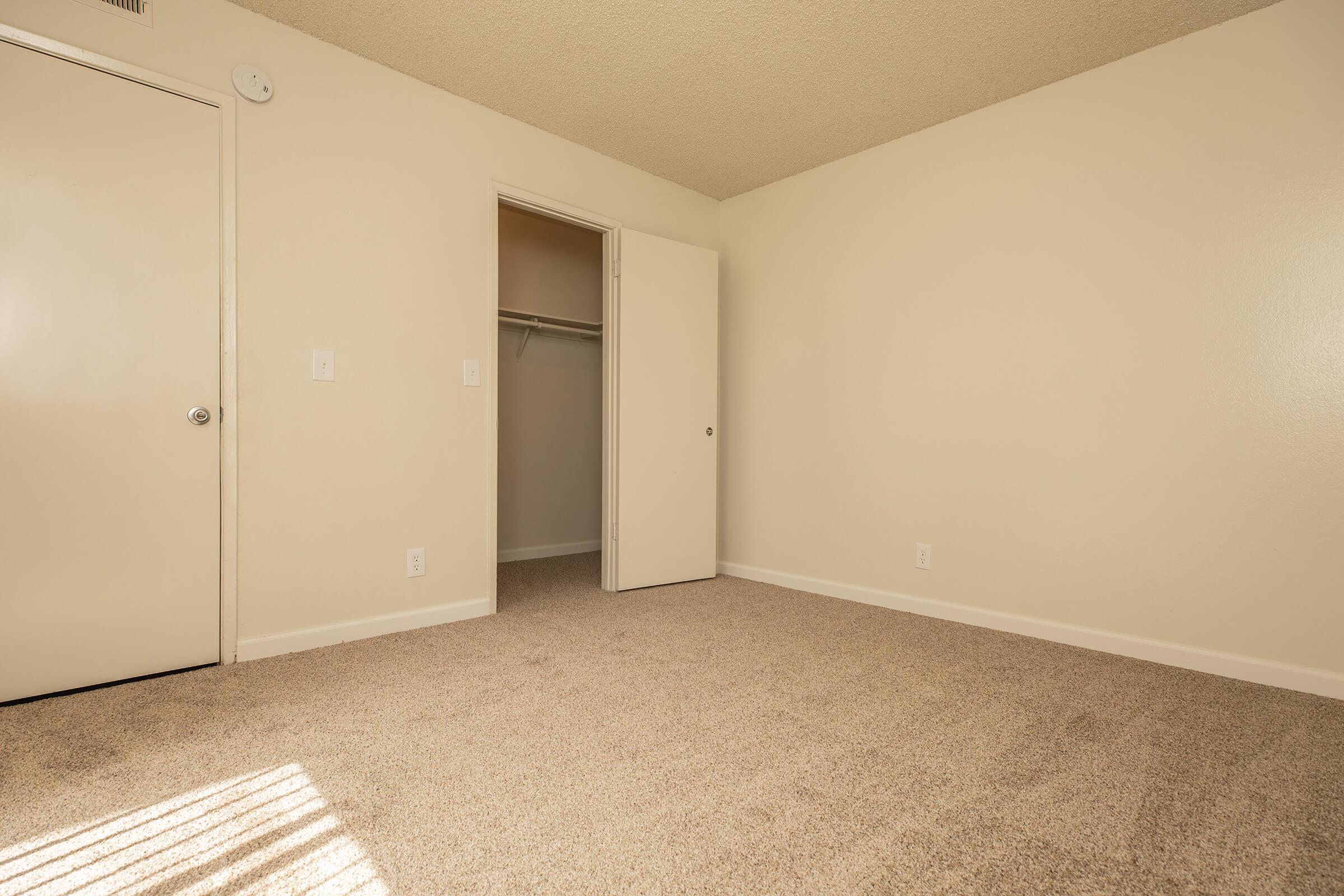 a refrigerator in a small room