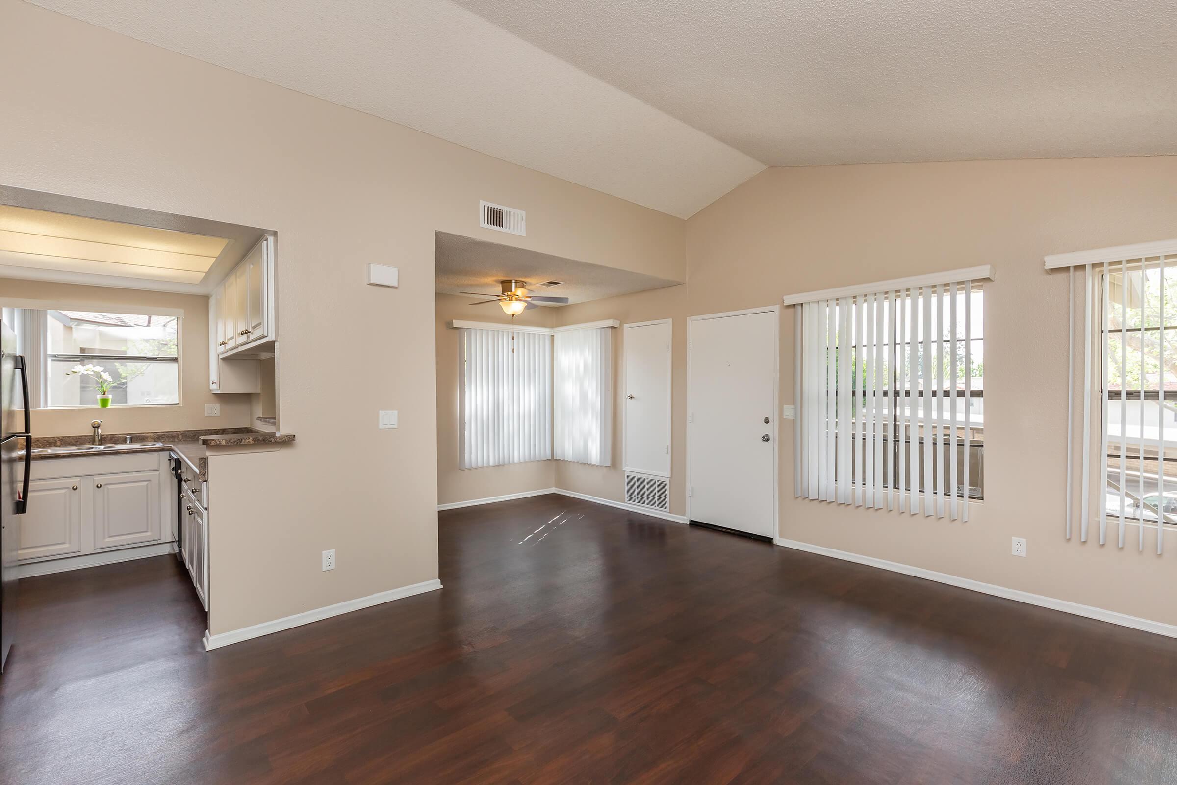 Dining room and living room with wooden floors