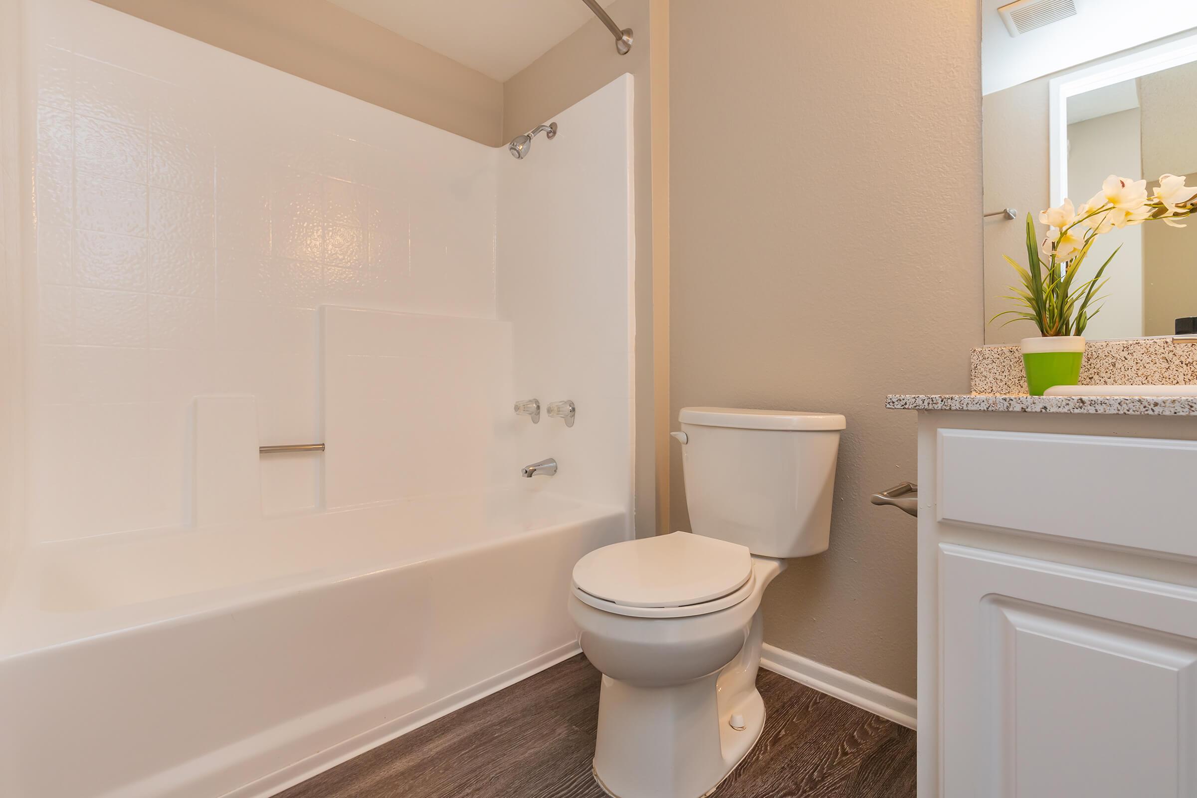 Bathroom with white cabinets