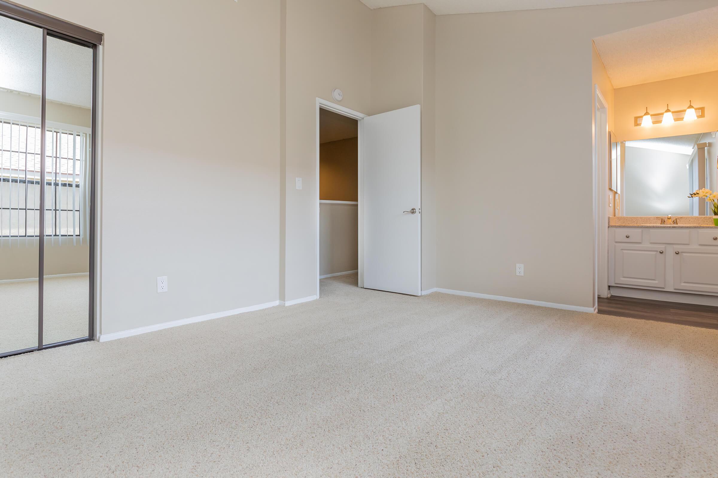 Unfurnished bedroom with carpet