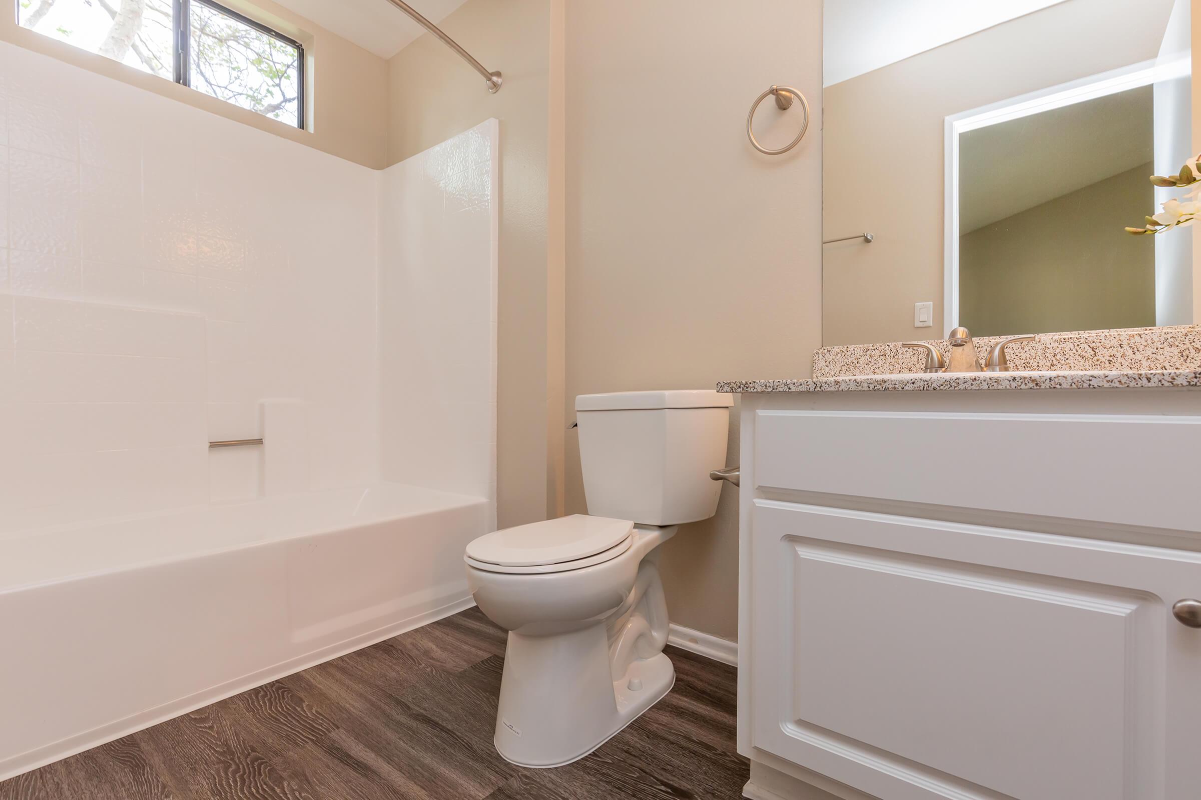 Unfurnished bathroom with wooden floors