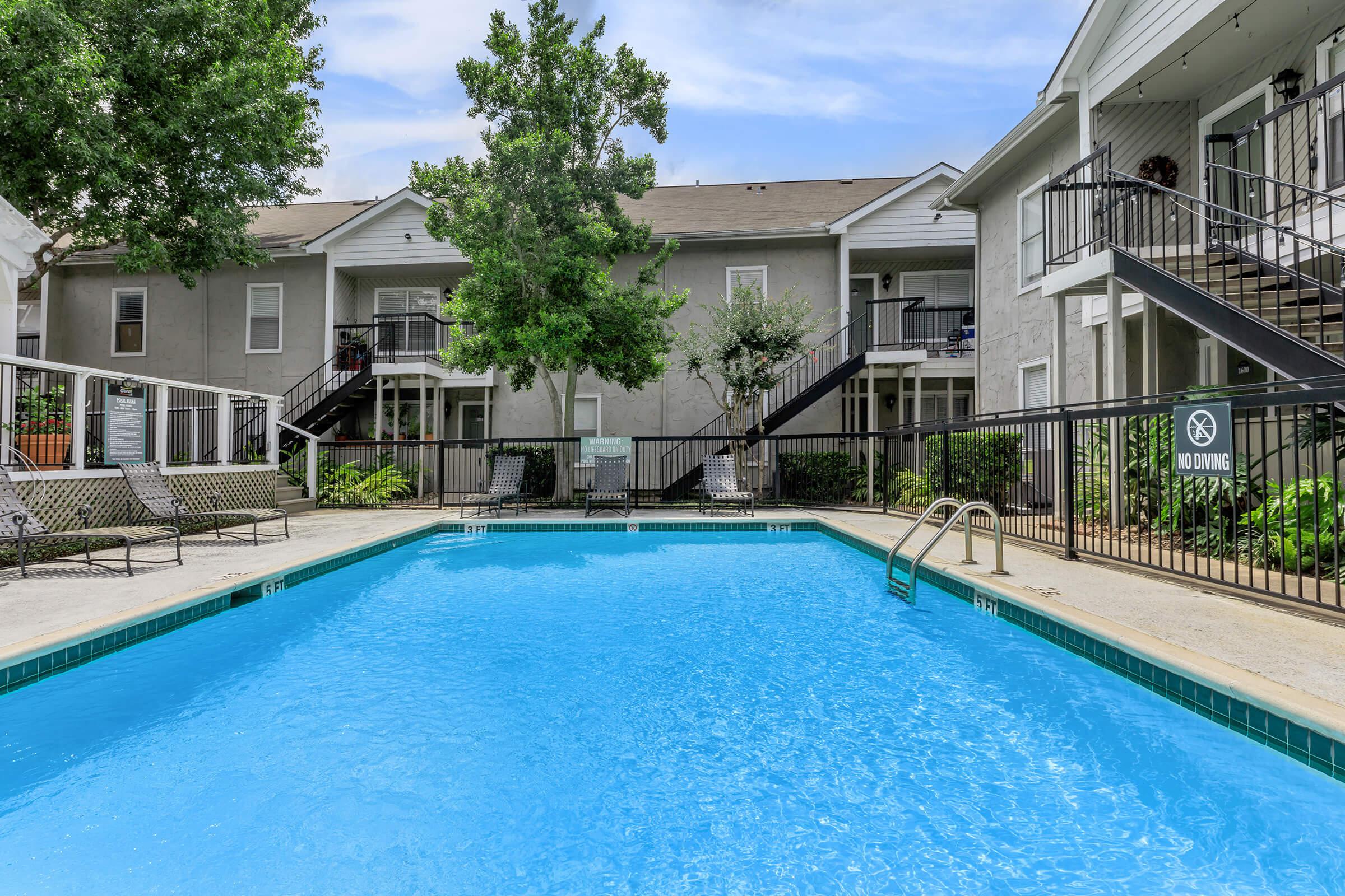 a house with a large pool of water