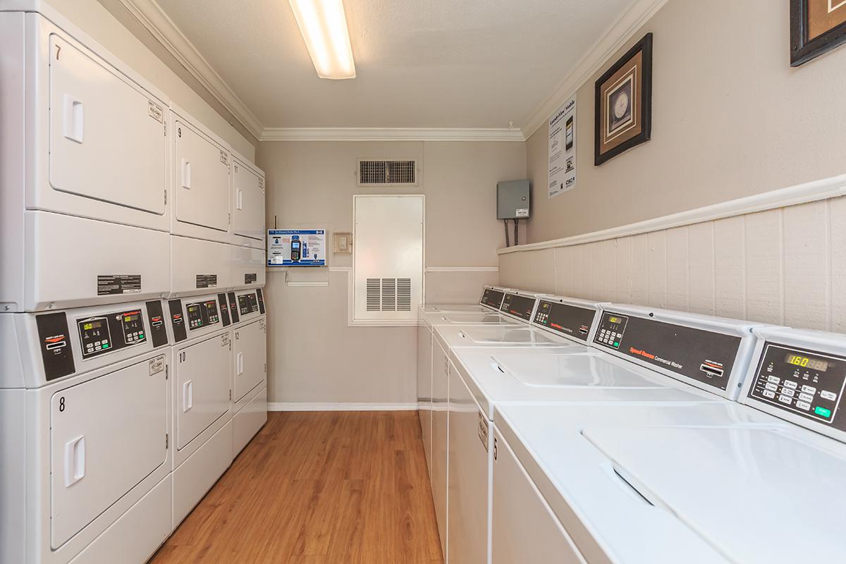 a white refrigerator freezer sitting inside of a kitchen