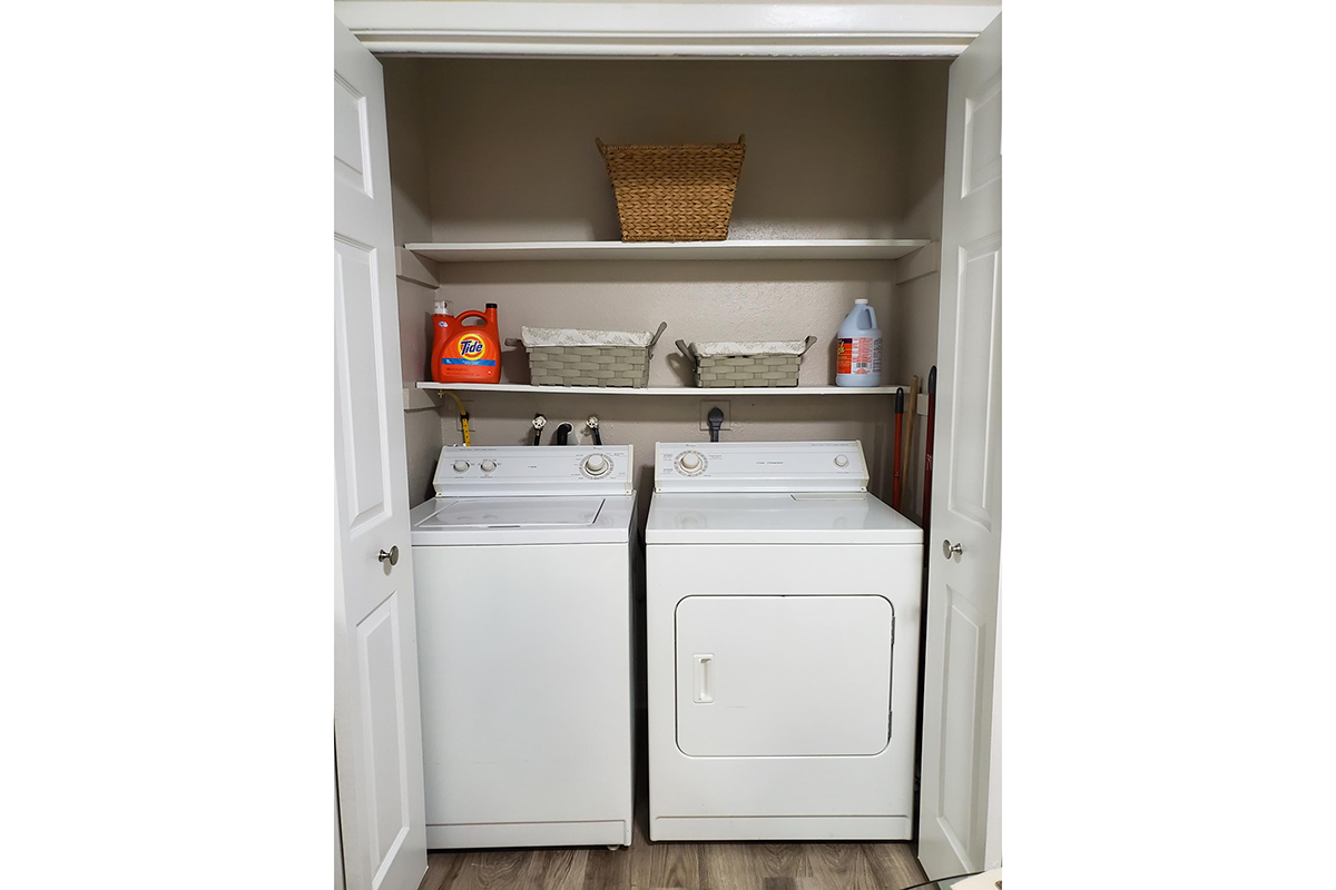 a white refrigerator freezer sitting in a room